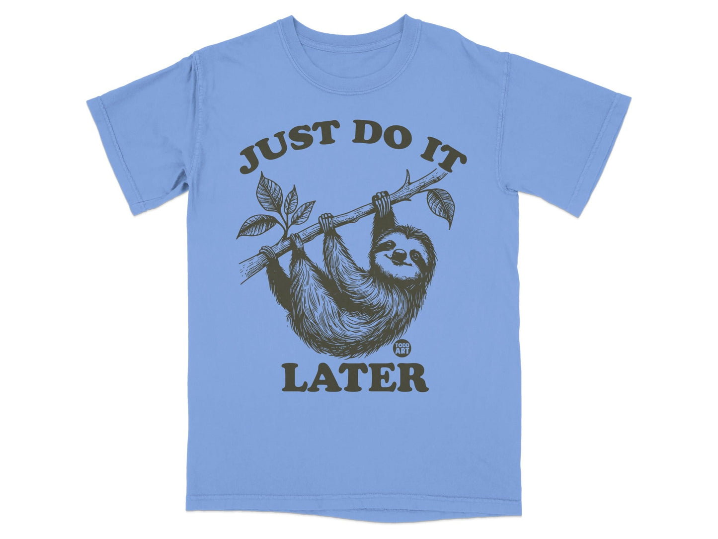 Blue t-shirt with sloth hanging from a branch, text "JUST DO IT LATER".