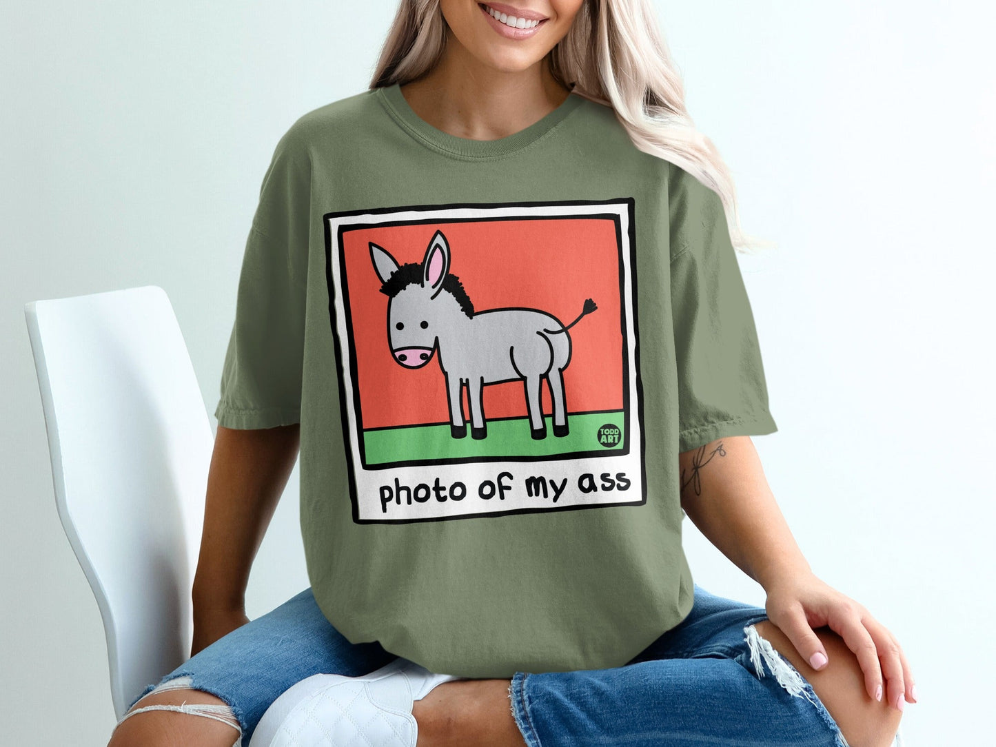 Green t-shirt with cartoon donkey and text "photo of my ass".