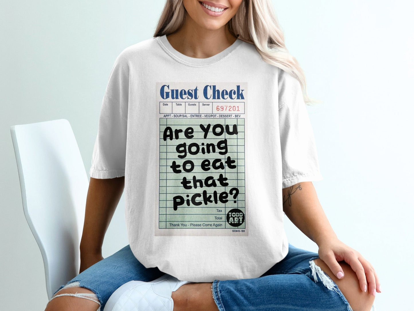 White t-shirt with "Are you going to eat that Pickle?" guest check graphic.