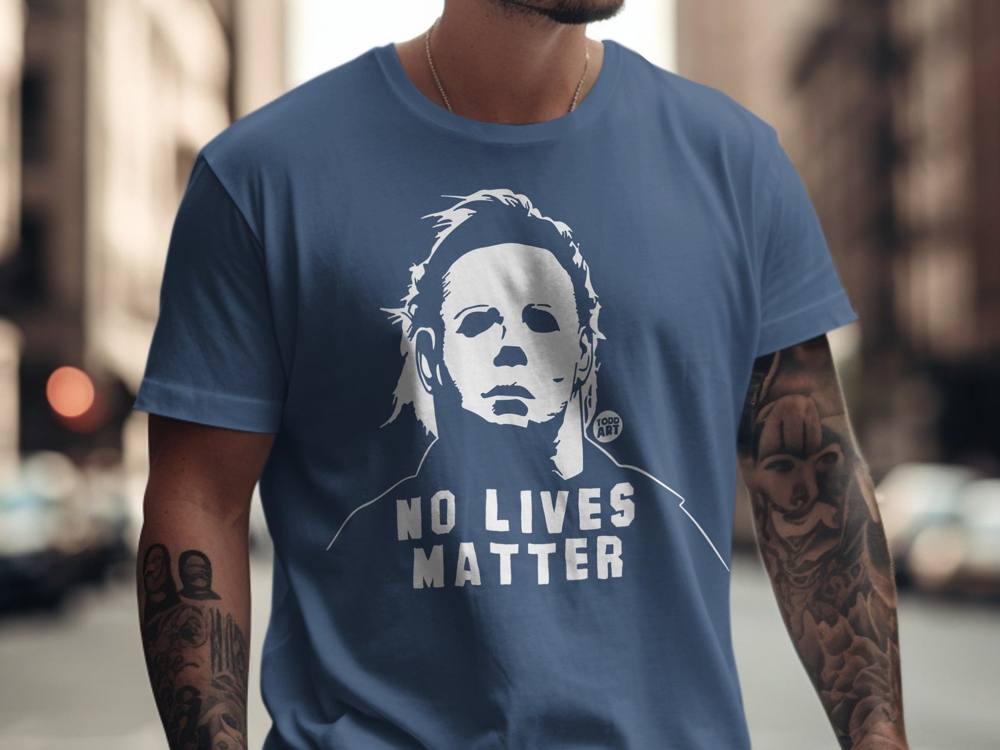Blue t-shirt with Michael Myers graphic and "NO LIVES MATTER" text.