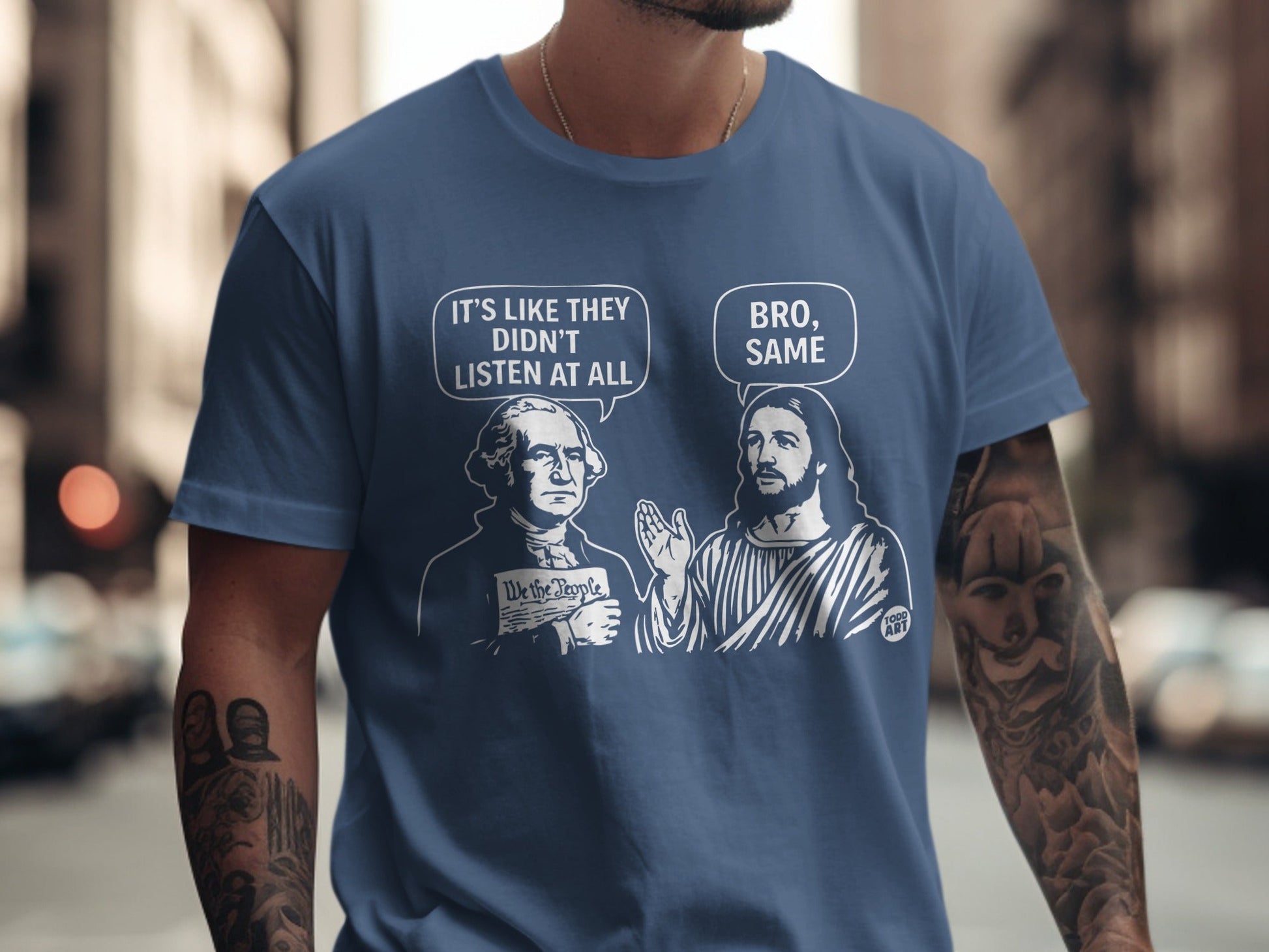 T-shirt graphic of George Washington and Jesus discussing "We the People."