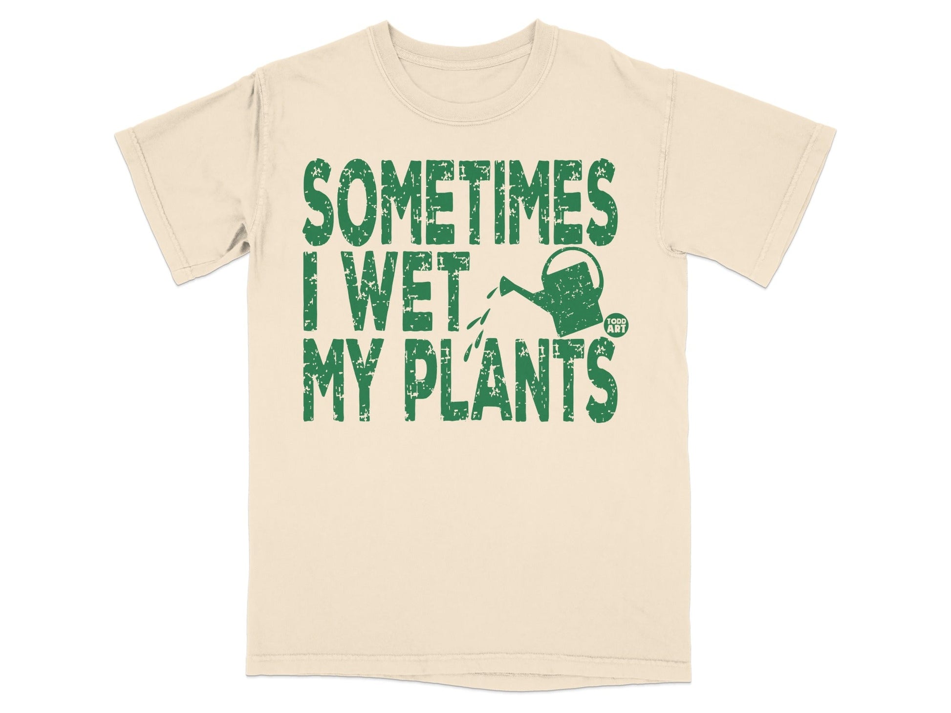 Cream t-shirt with green text "Sometimes I Wet My Plants" and a watering can.