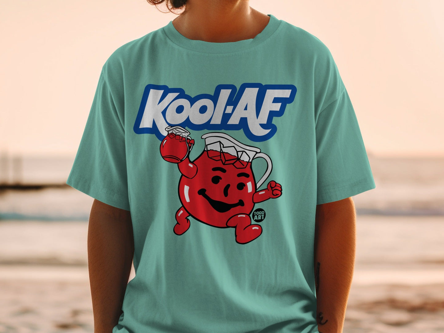 Teal t-shirt with Kool-Aid Man character and "Kool-AF" text.
