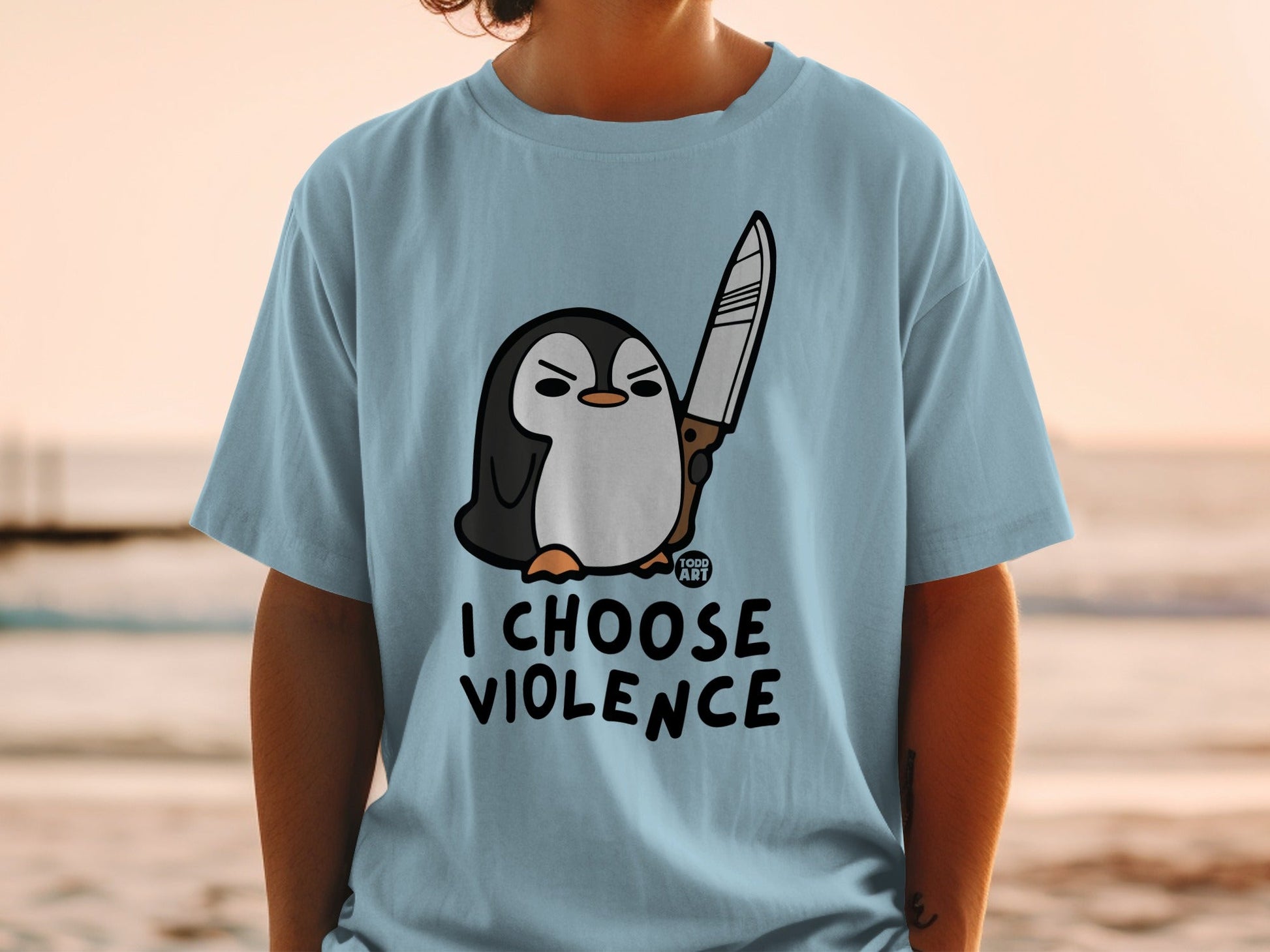 Cartoon penguin holding a knife, text "I CHOOSE VIOLENCE".