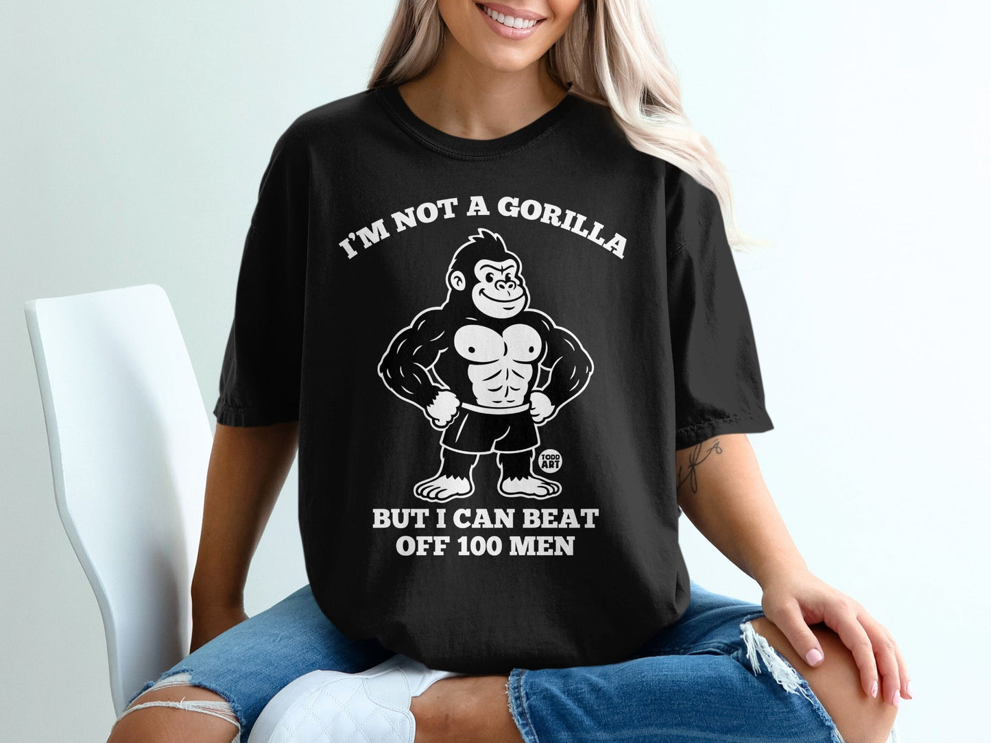 Black t-shirt with gorilla graphic and text: I'M NOT A GORILLA BUT I CAN BEAT OFF 100 MEN.