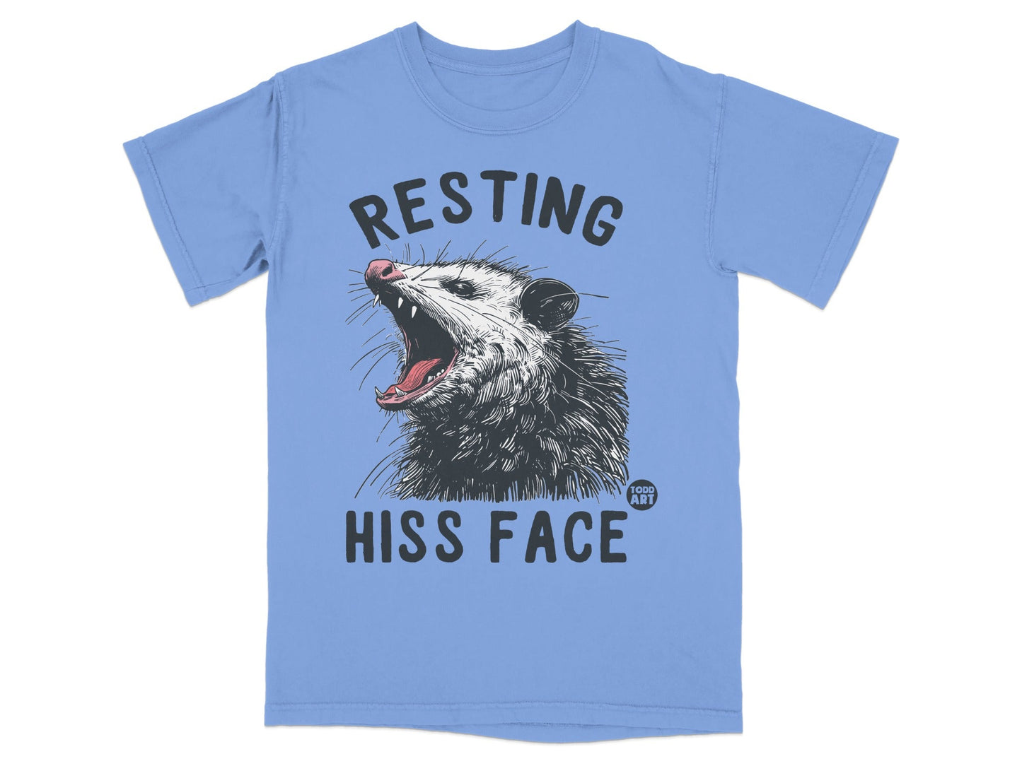 Light blue t-shirt with "Resting Hiss Face" and a yawning opossum graphic.