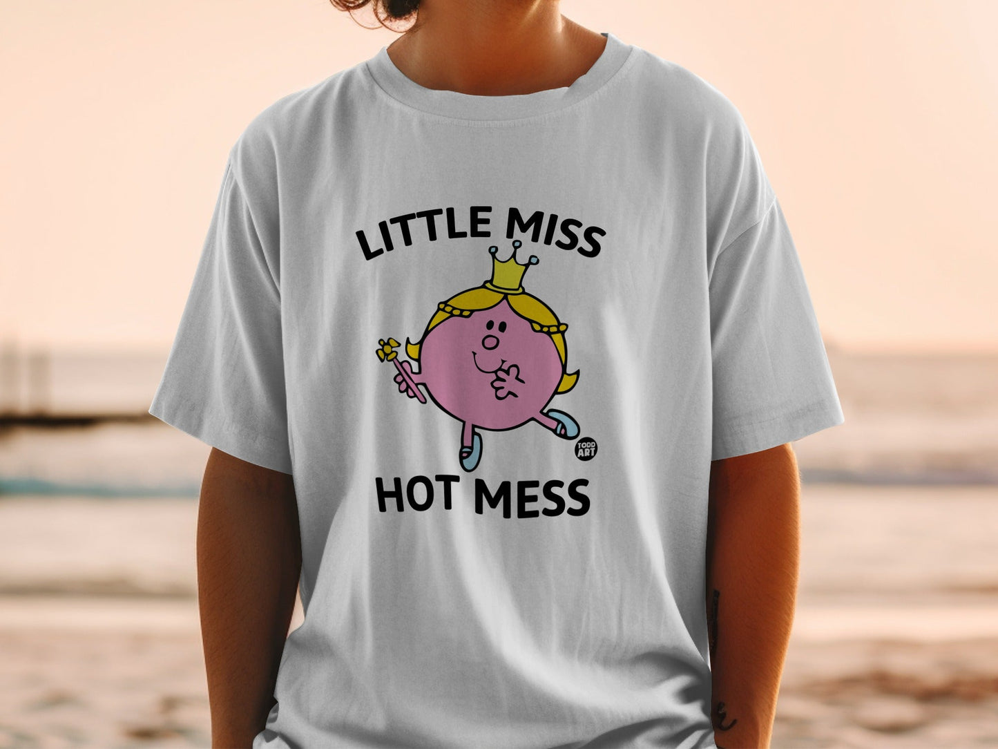 Little Miss Hot Mess graphic on a white t-shirt.