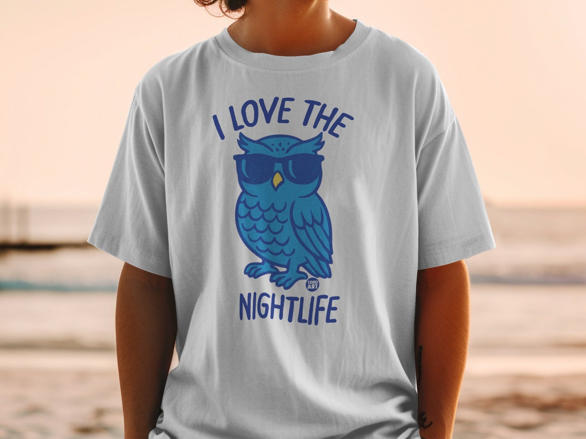 T-shirt with blue owl wearing sunglasses, text "I LOVE THE NIGHTLIFE".