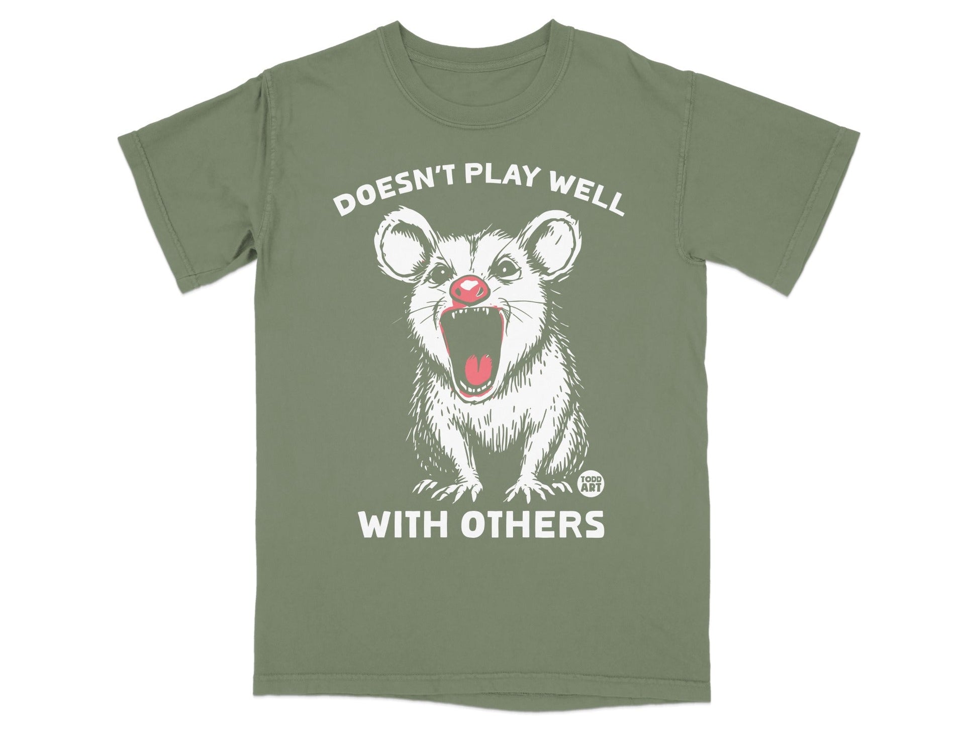 Green t-shirt with a screaming possum and text "DOESN'T PLAY WELL WITH OTHERS".