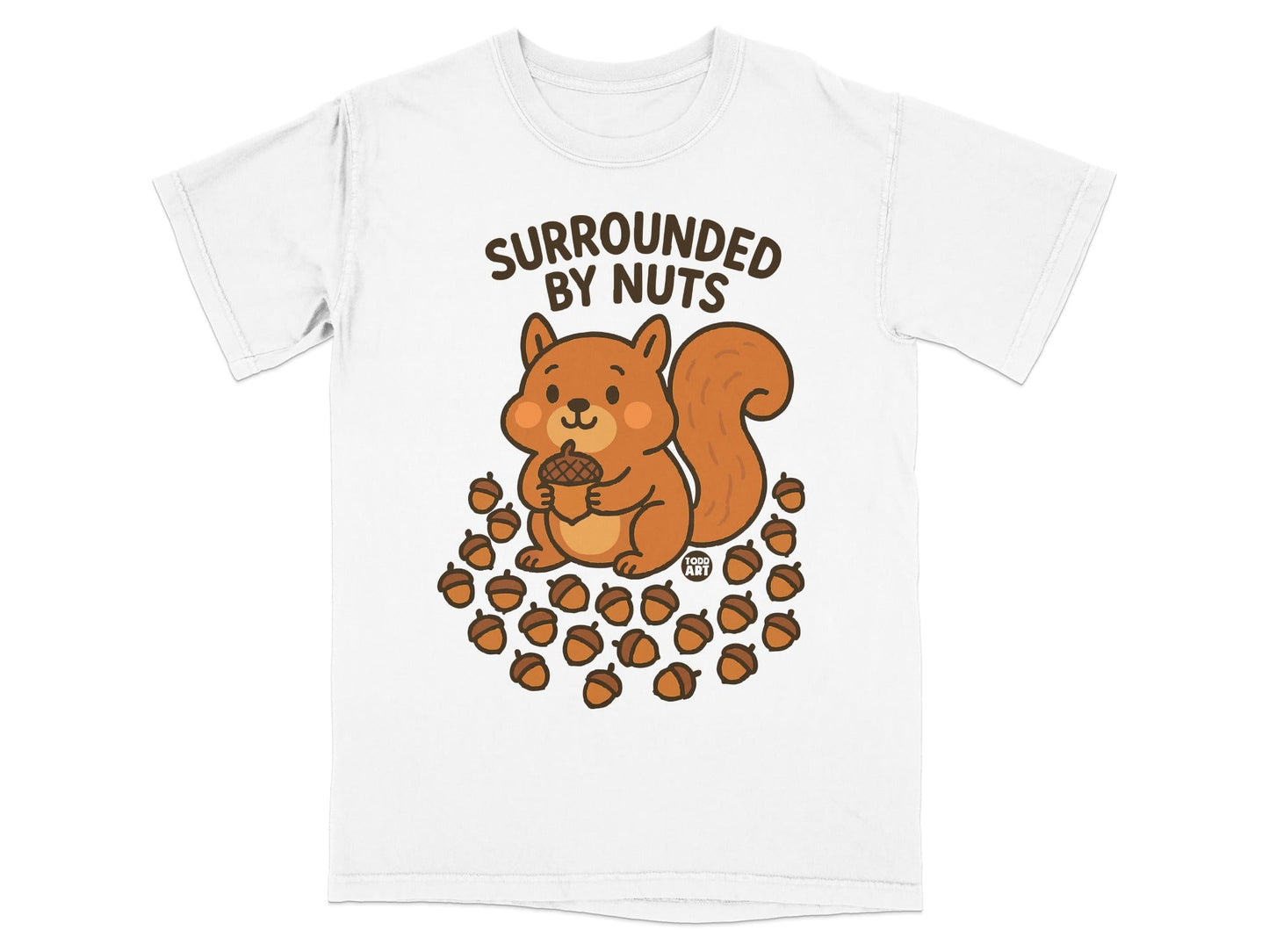 White t-shirt with cartoon squirrel surrounded by acorns and text "Surrounded by Nuts".