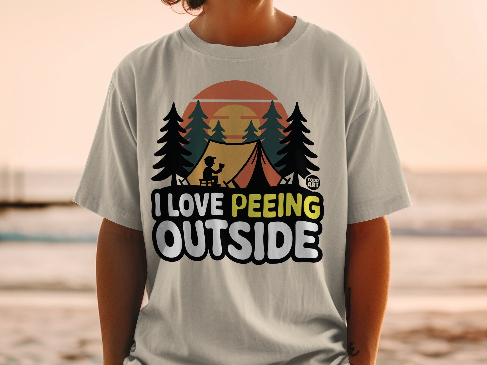 T-shirt with "I Love Peeing Outside" text and a camping scene.