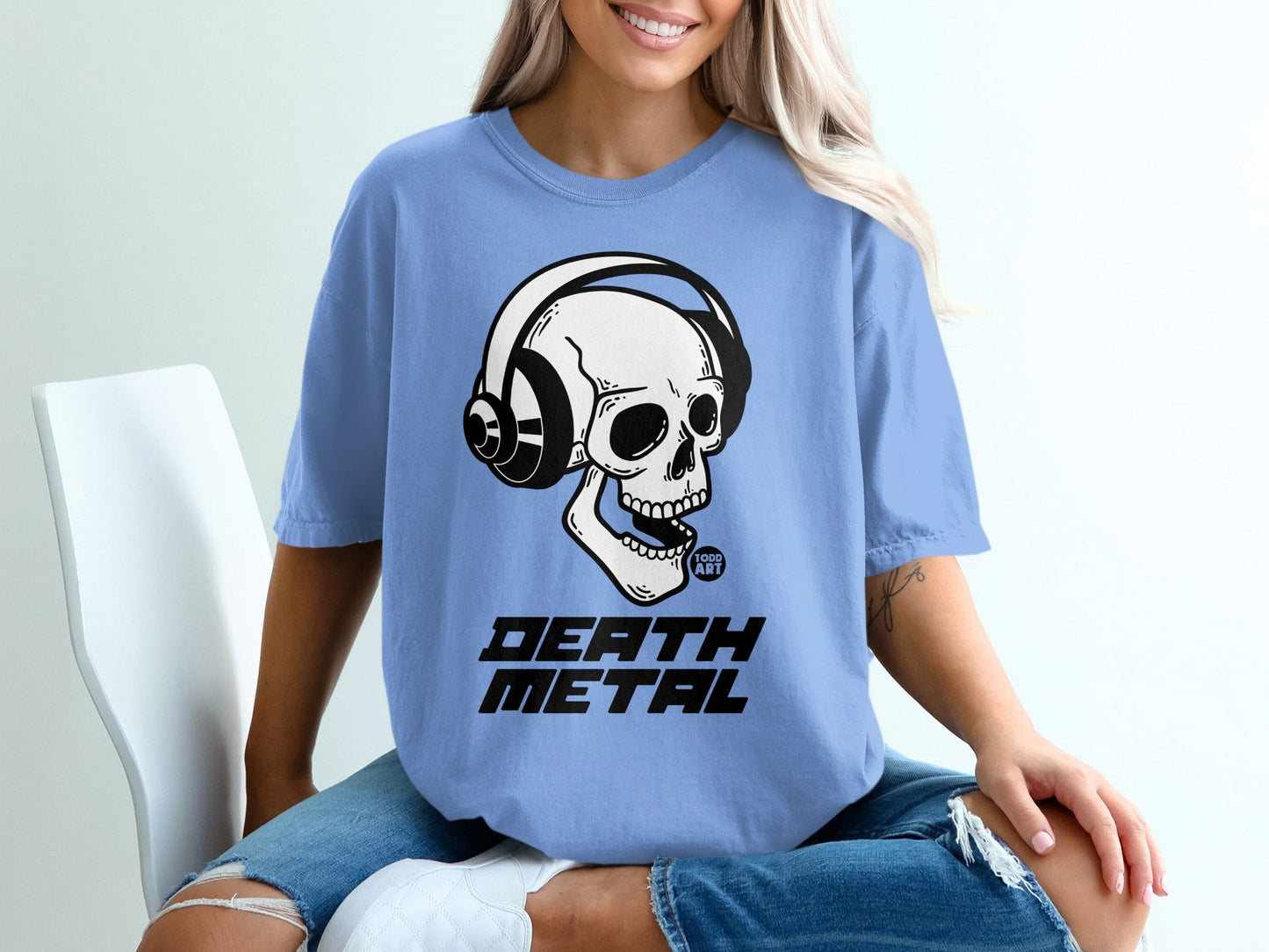Blue t-shirt with skull wearing headphones and "DEATH METAL" text.