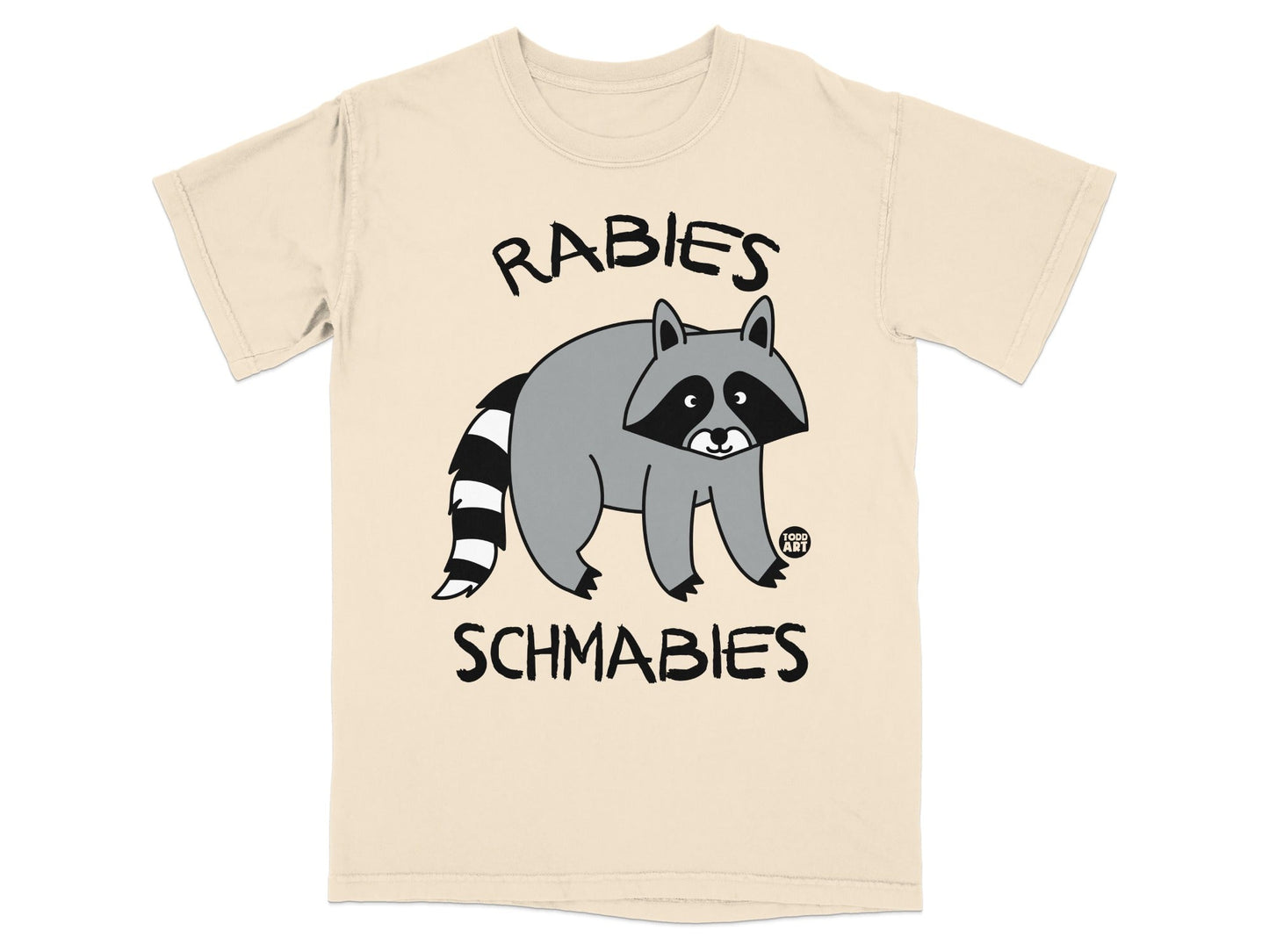 T-shirt with cartoon raccoon saying "Rabies Schmabies"
