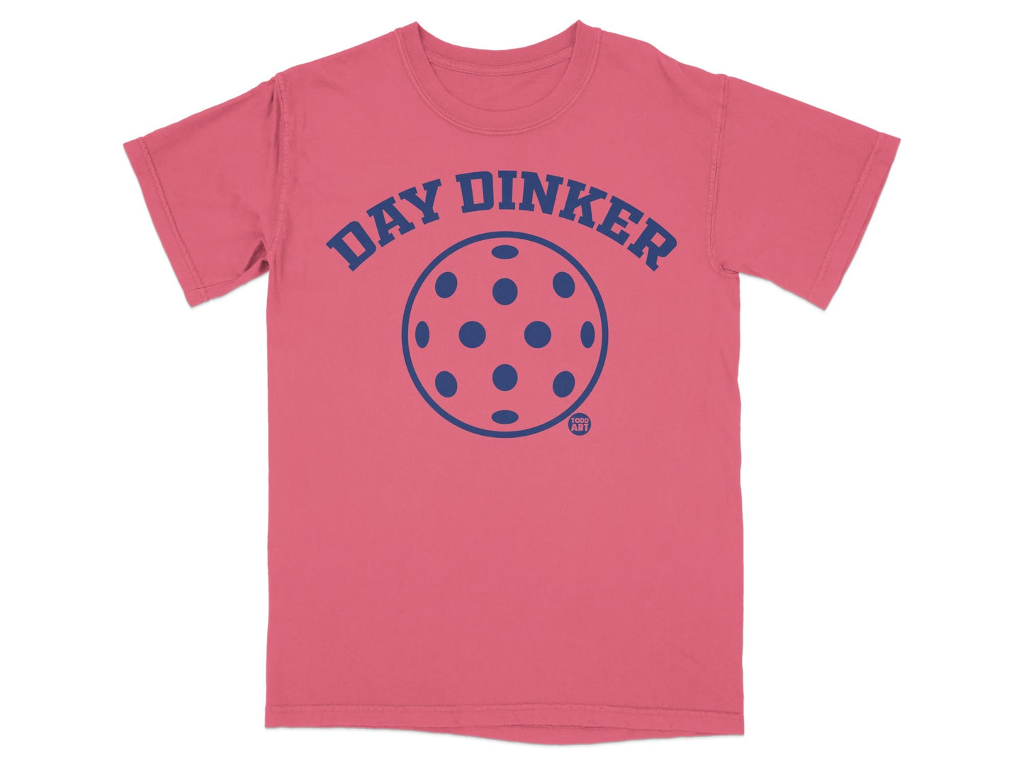 Salmon t-shirt with "DAY DINKER" text and pickleball graphic.