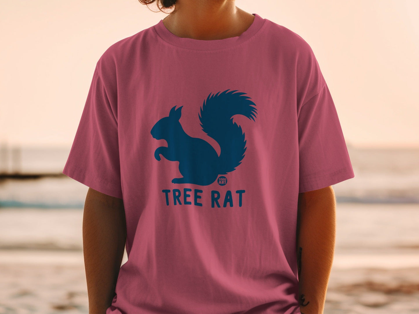 Pink t-shirt with blue squirrel logo and "Tree Rat" text.