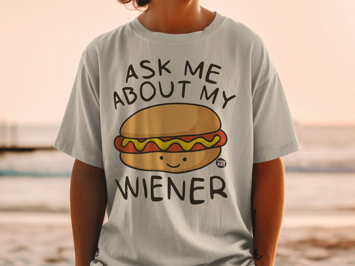 T-shirt with a cartoon hot dog and "Ask Me About My Wiener" text.