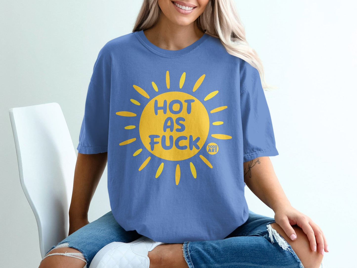 Blue t-shirt with yellow sun graphic and "HOT AS FUCK" text.