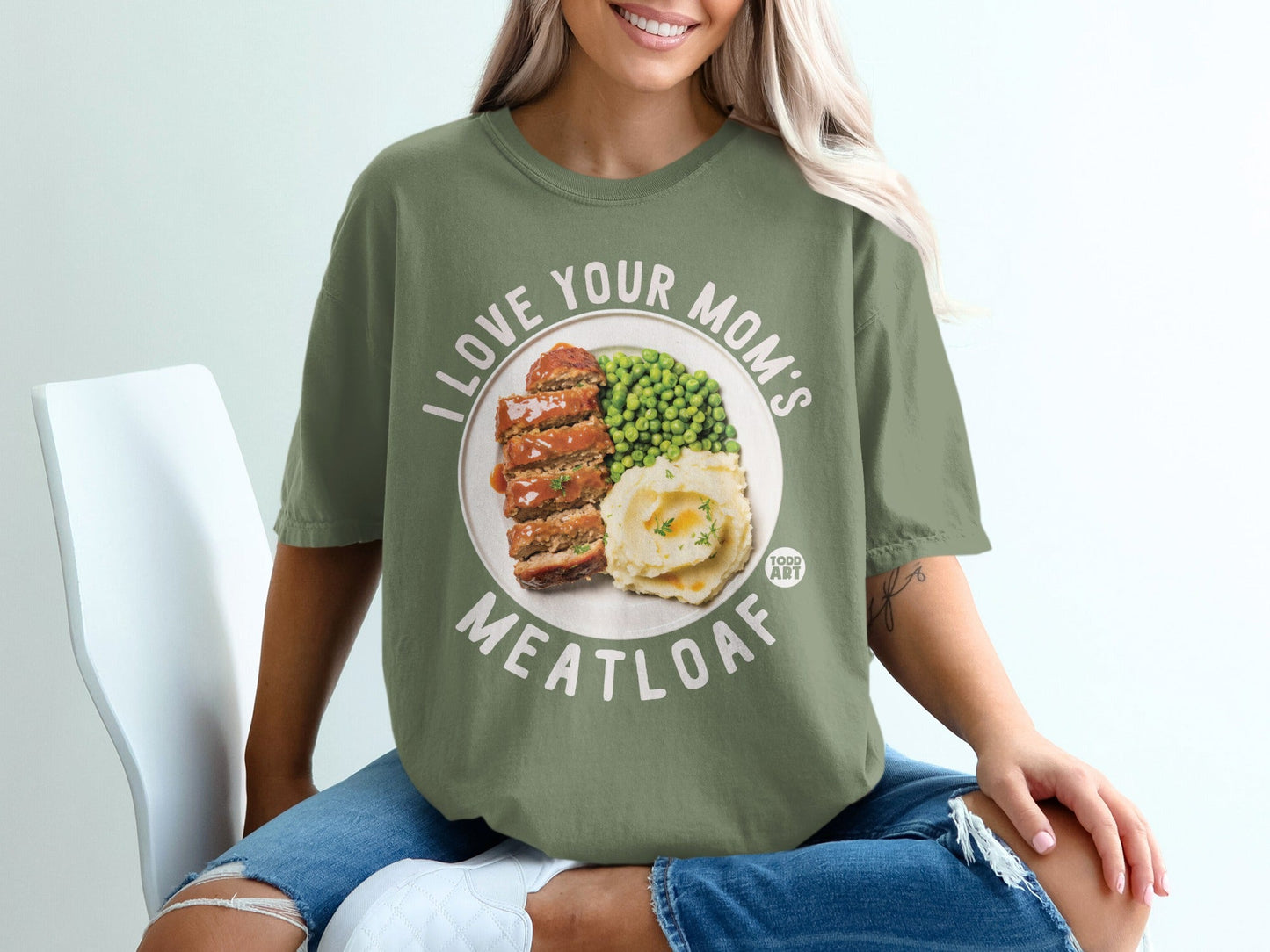 Green t-shirt with "I LOVE YOUR MOM'S MEATLOAF" text and meatloaf dinner graphic.
