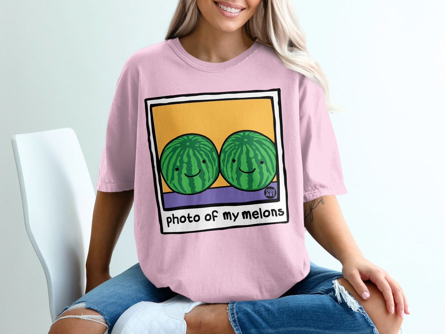 Pink t-shirt with cartoon watermelons and "photo of my melons" text.