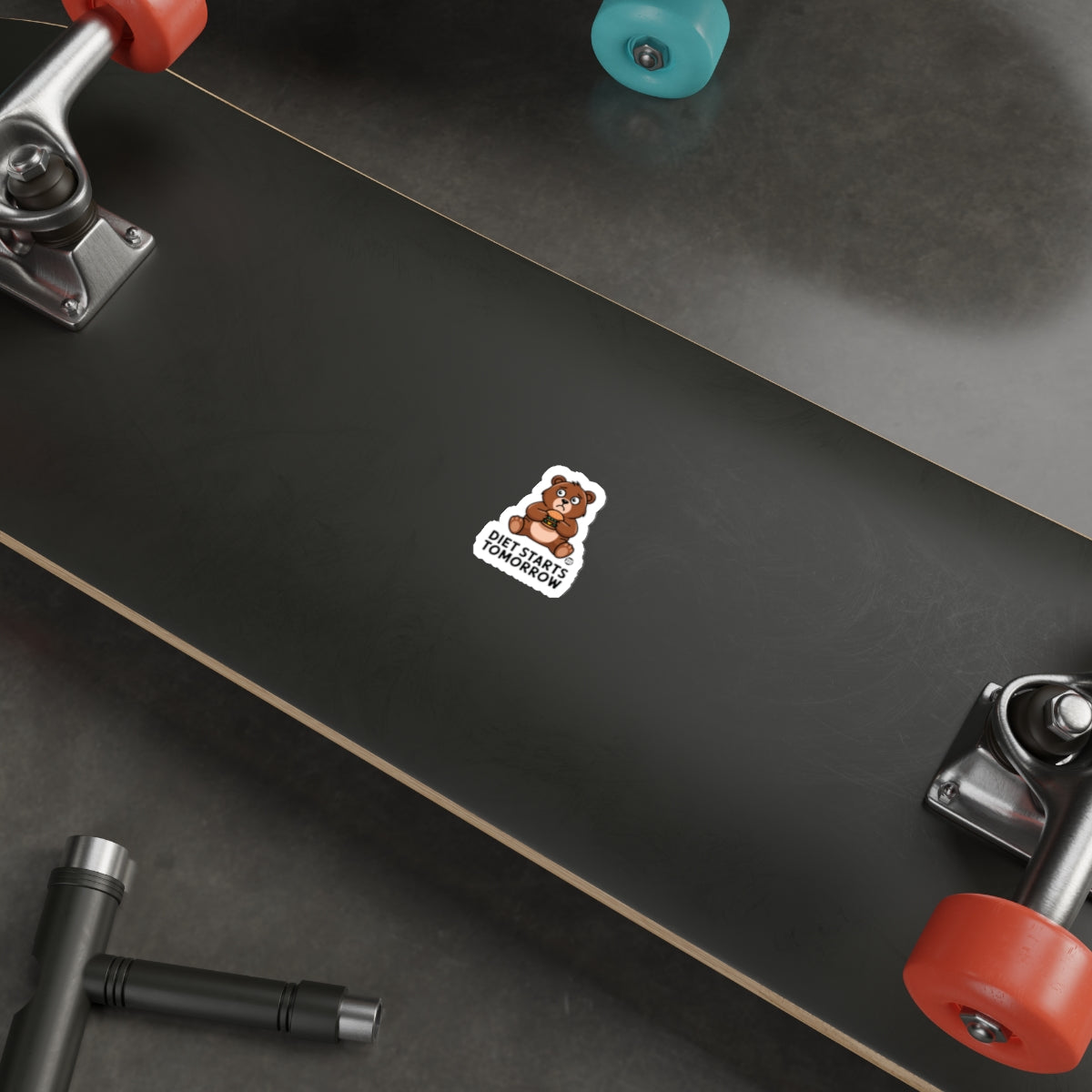 Colorful skateboard with cute bear sticker design