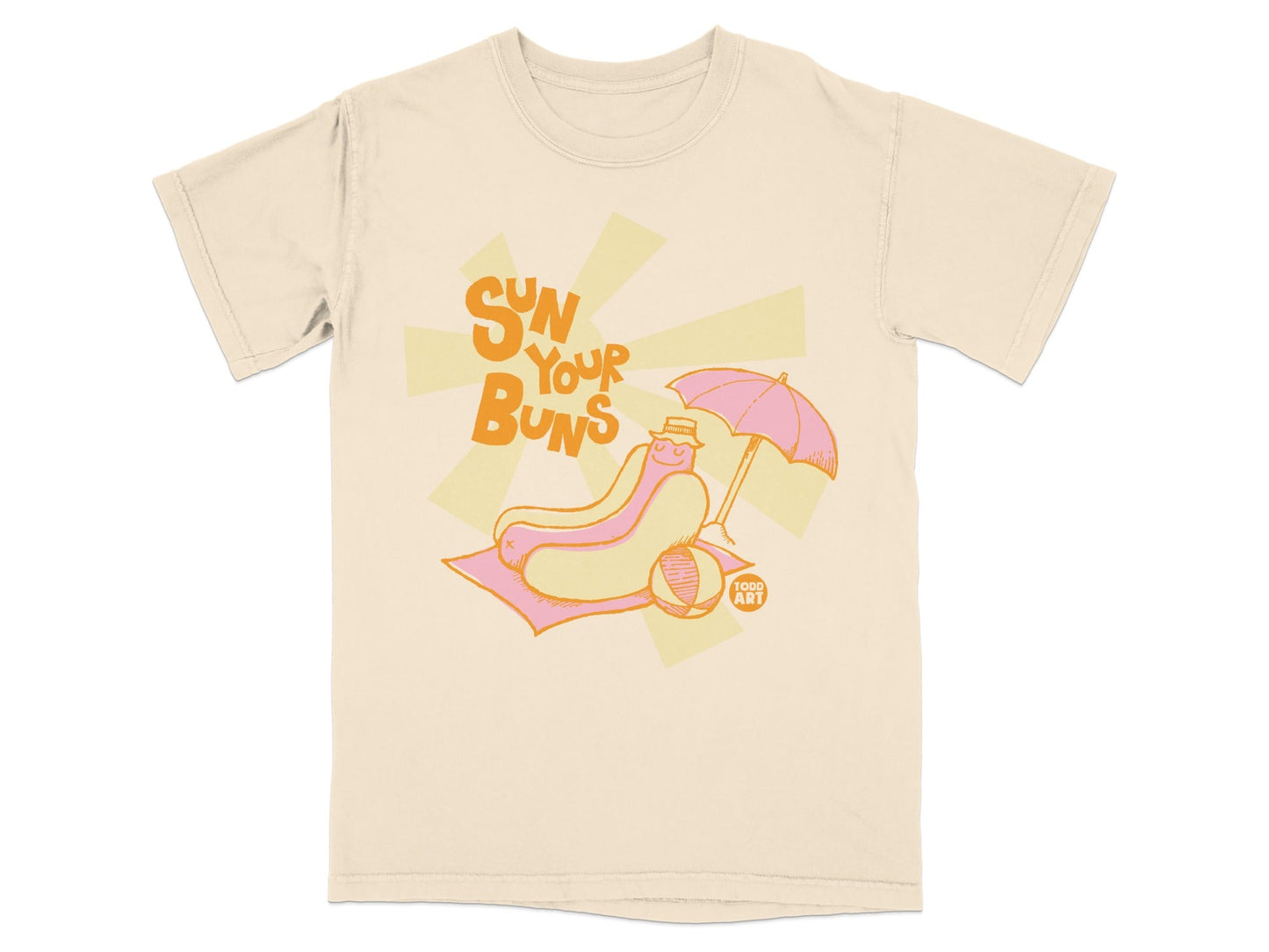 T-shirt with a hot dog wearing a hat and holding an umbrella on a beach towel.