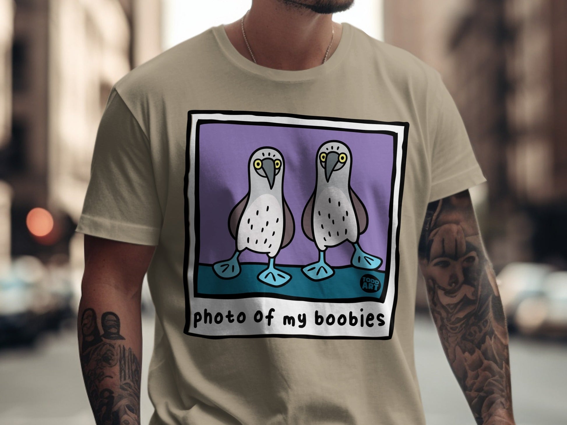 T-shirt graphic of two blue-footed boobies with "TODD ART" and "photo of my boobies".