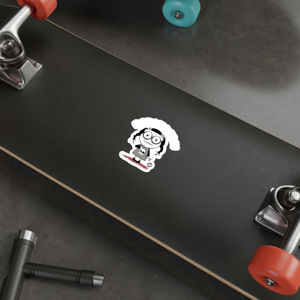 Cute Cartoon Character Sticker on Black Skateboard Deck