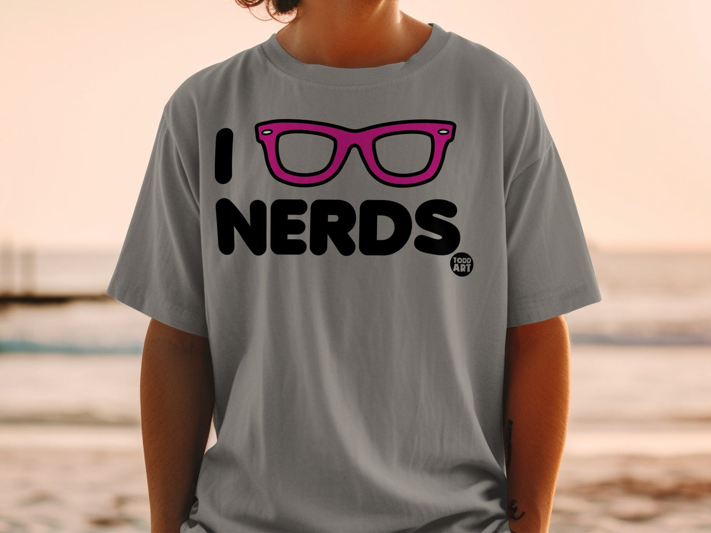 Gray t-shirt with "I LOVE NERDS" text and pink eyeglasses graphic.