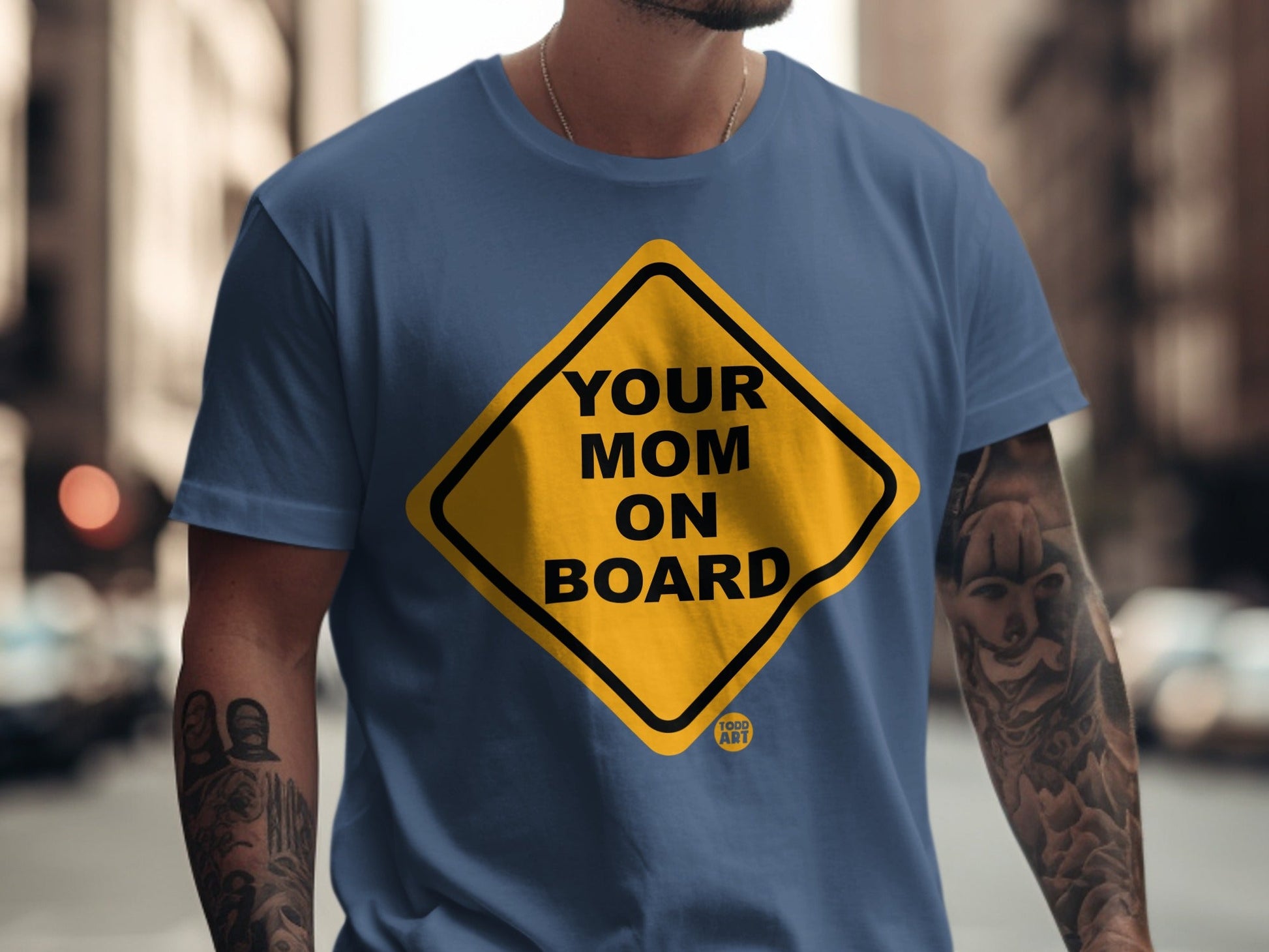 Dark blue t-shirt with yellow diamond "YOUR MOM ON BOARD" graphic.