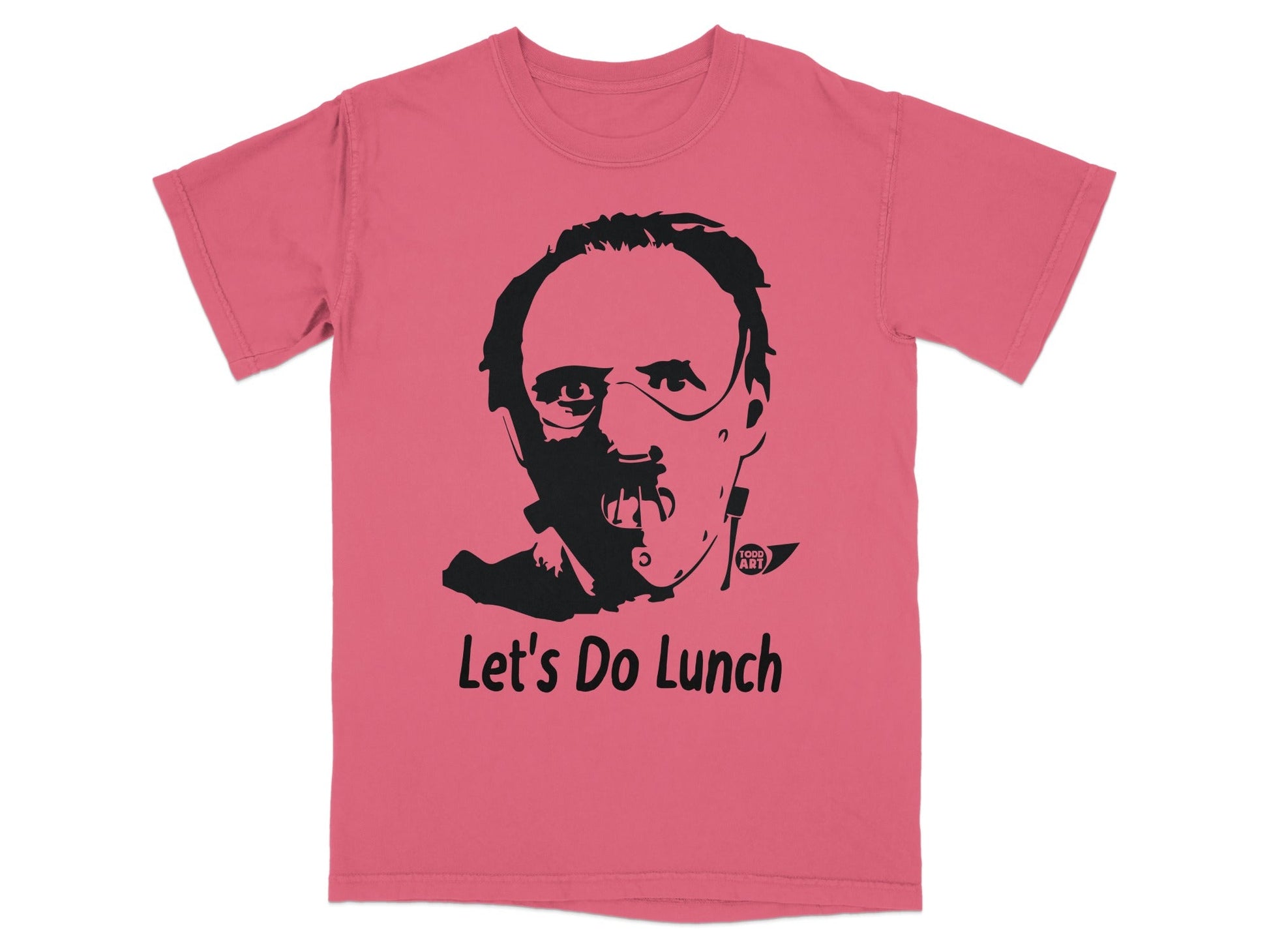 Pink t-shirt with black graphic of Hannibal Lecter saying "Let's Do Lunch."