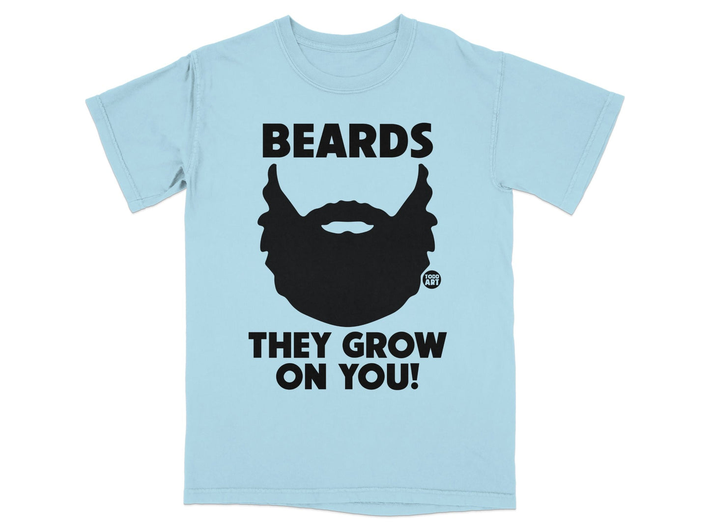 Light blue t-shirt with black text and beard graphic: "BEARDS THEY GROW ON YOU!"