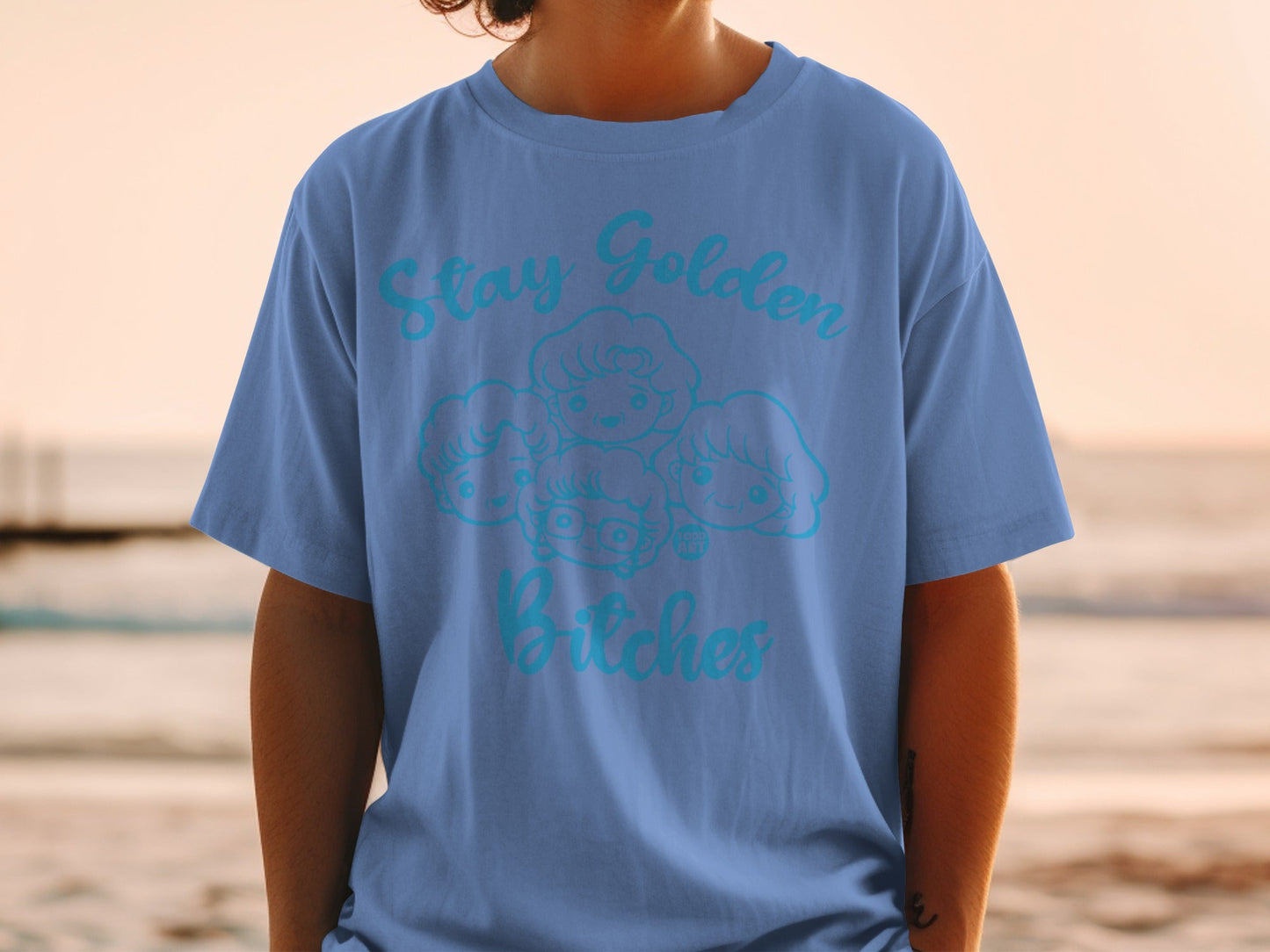 Blue t-shirt with "Stay Golden Bitches" and cartoon characters.