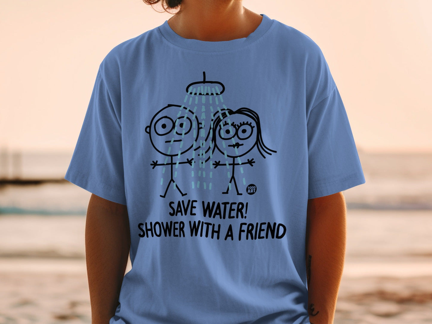 Blue t-shirt with stick figures showering together and text "SAVE WATER! SHOWER WITH A FRIEND".