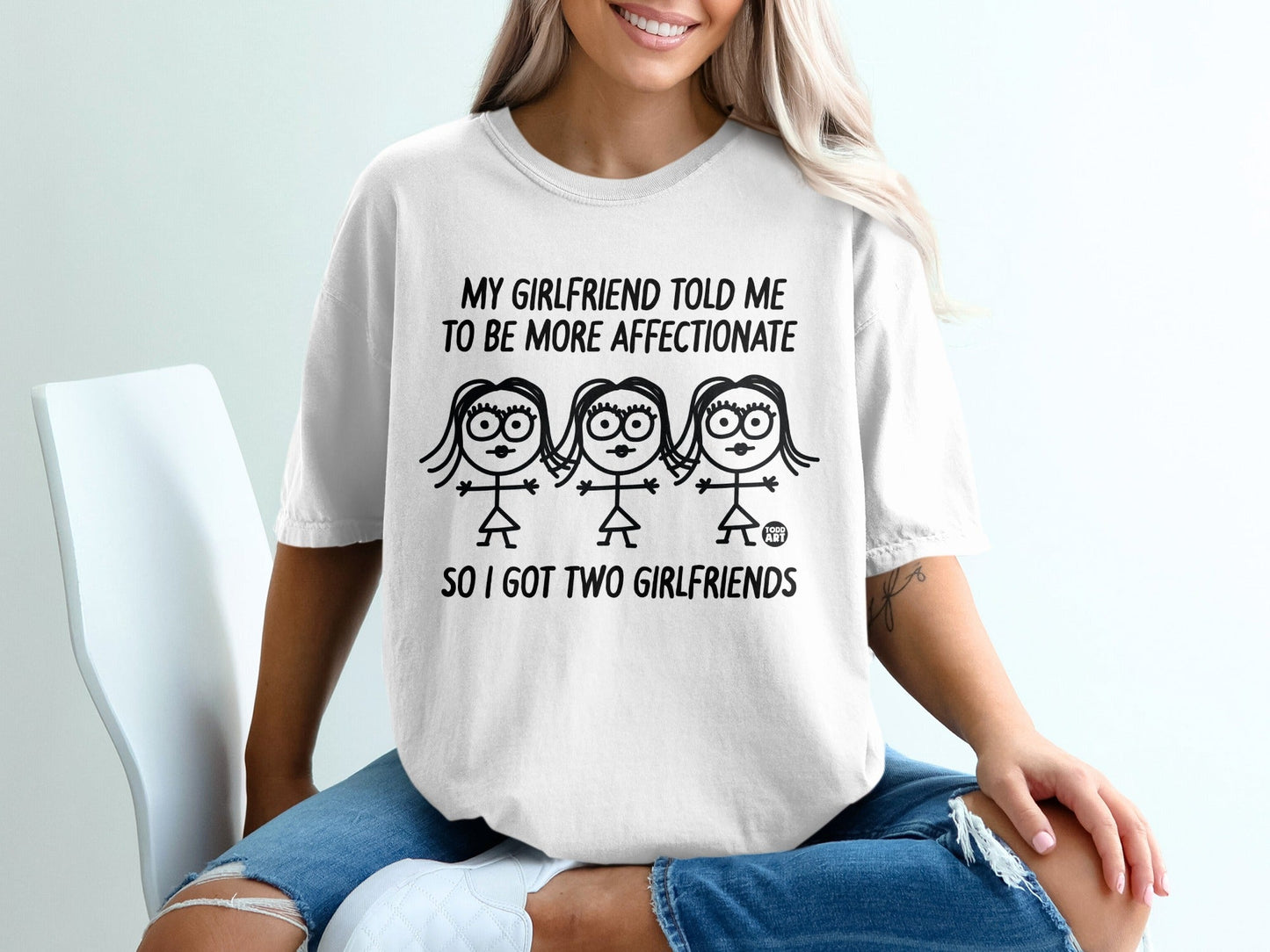 T-shirt with text: "My girlfriend told me to be more affectionate so I got two girlfriends"