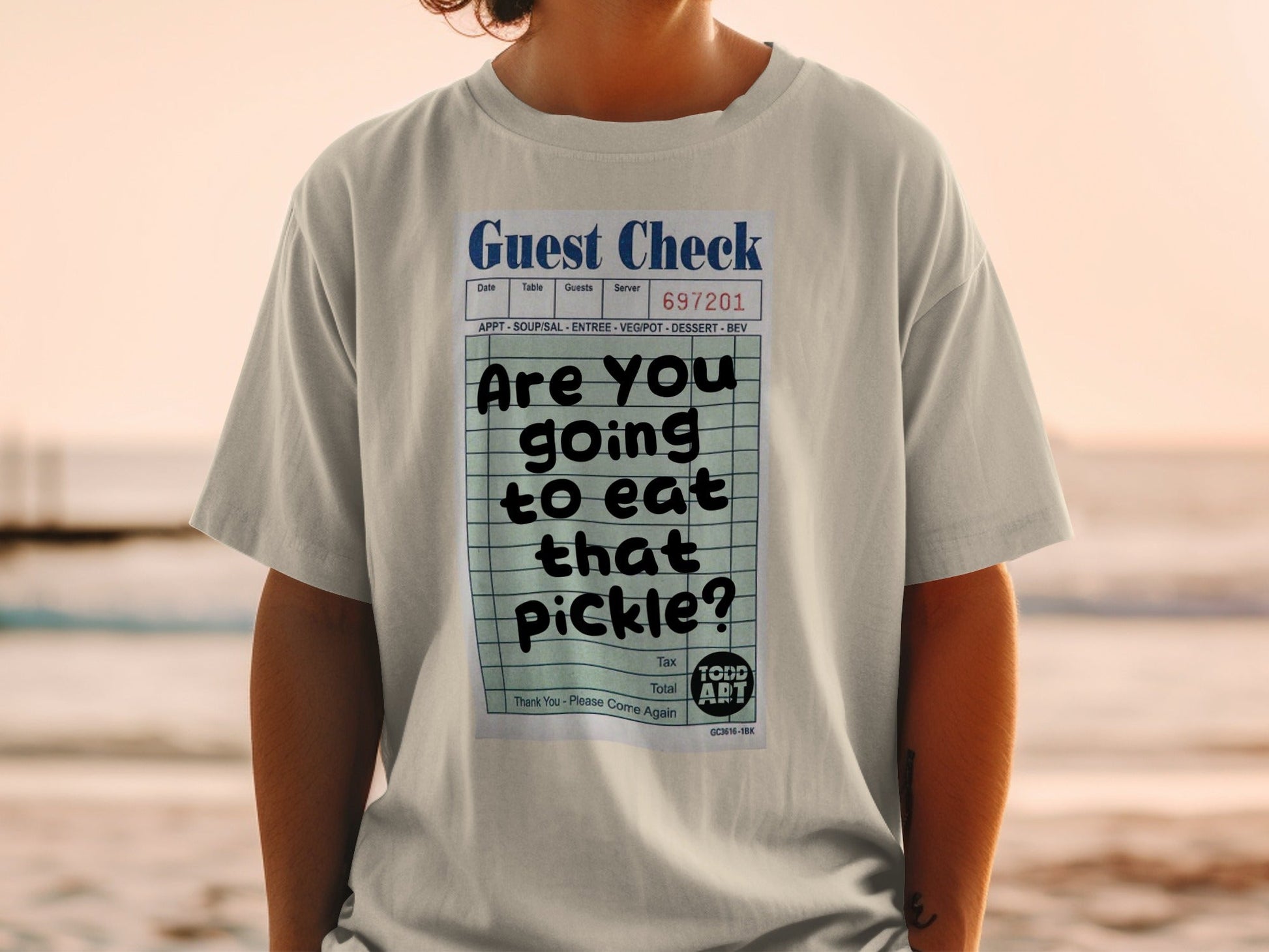 Guest check graphic tee with "Are you going to eat that pickle?" text.