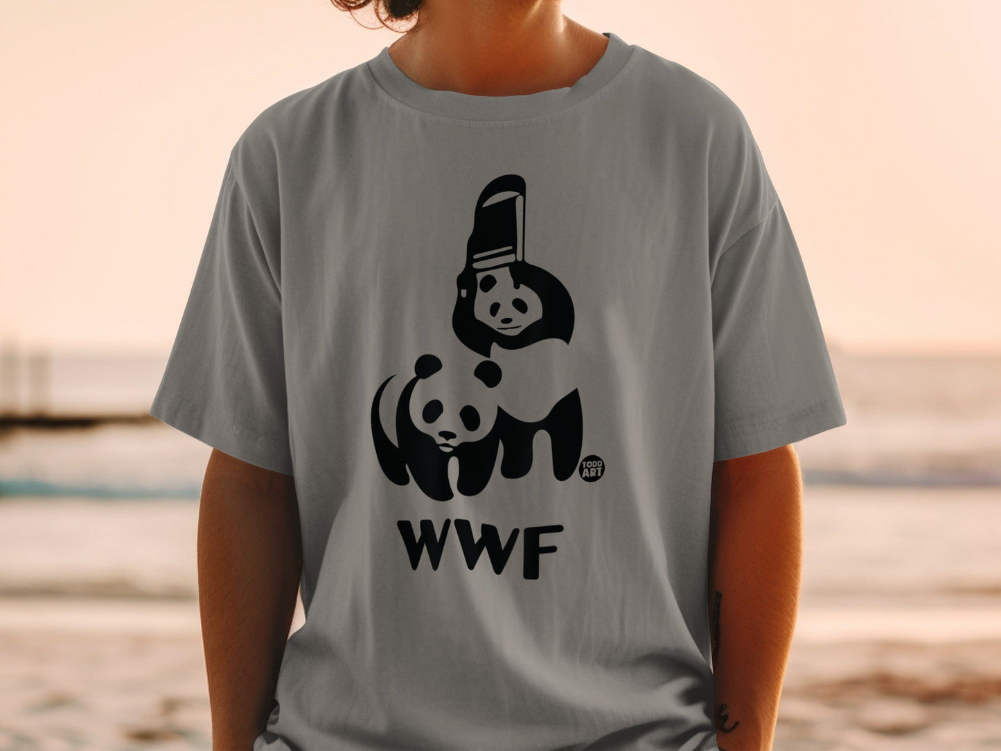 Gray t-shirt with black WWF panda logo and "GOOD ART" text.