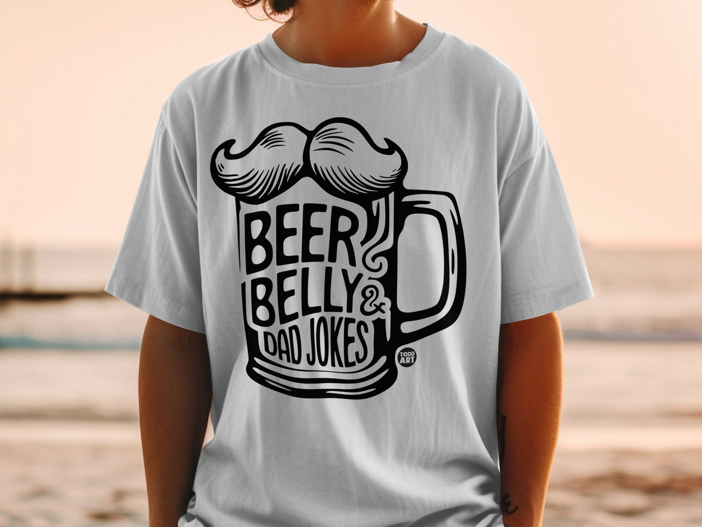 White t-shirt with "Beer Belly & Dad Jokes" text and mustache graphic.