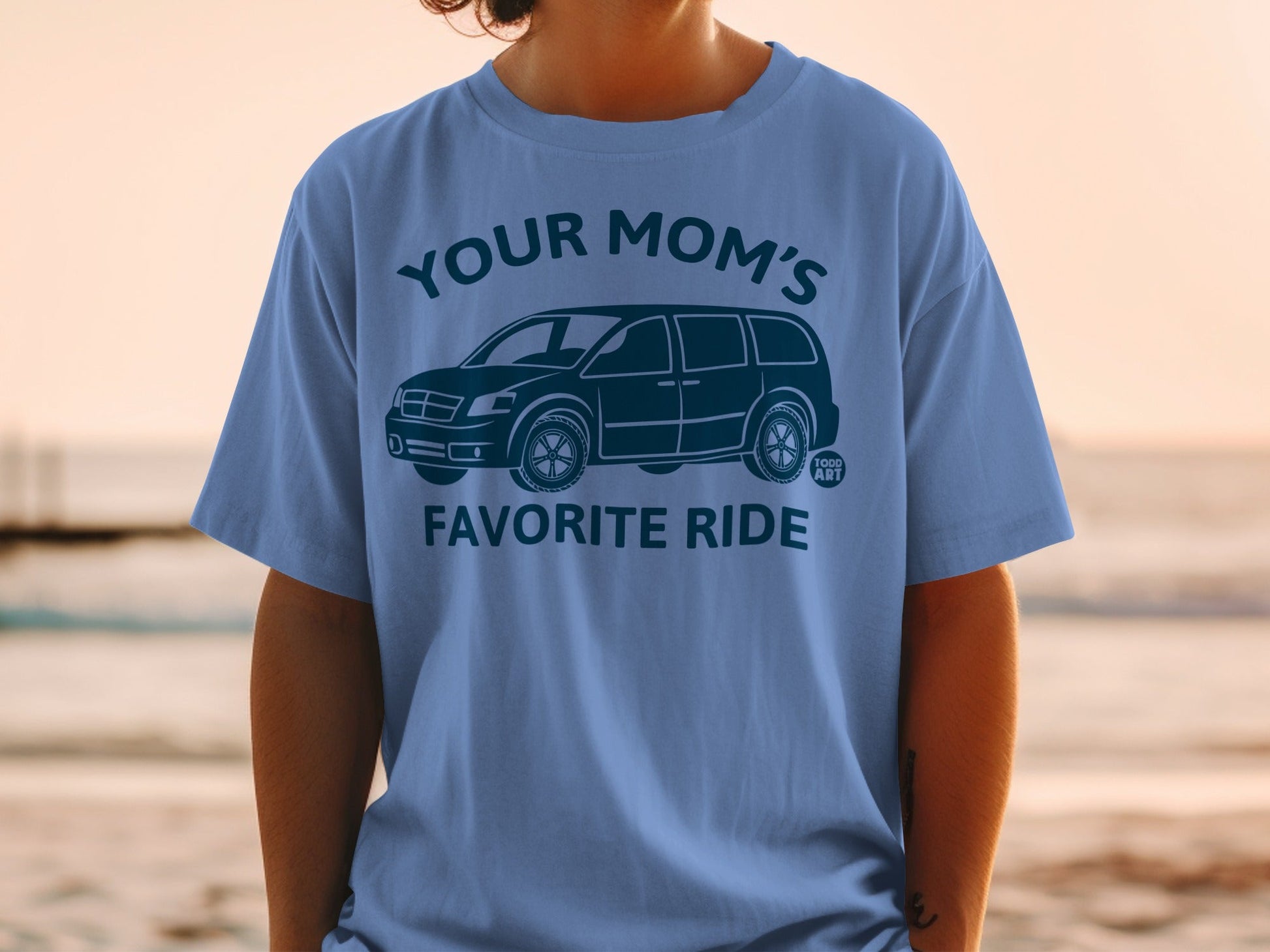 Blue t-shirt with "YOUR MOM'S FAVORITE RIDE" and a minivan graphic.