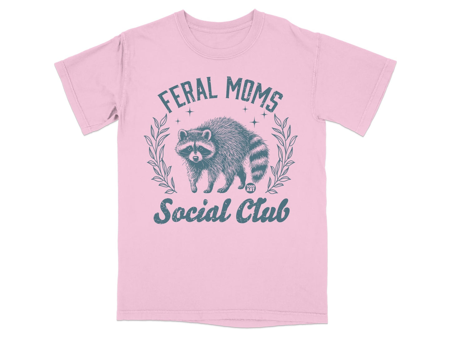 Pink t-shirt with raccoon graphic and text "Feral Moms Social Club".