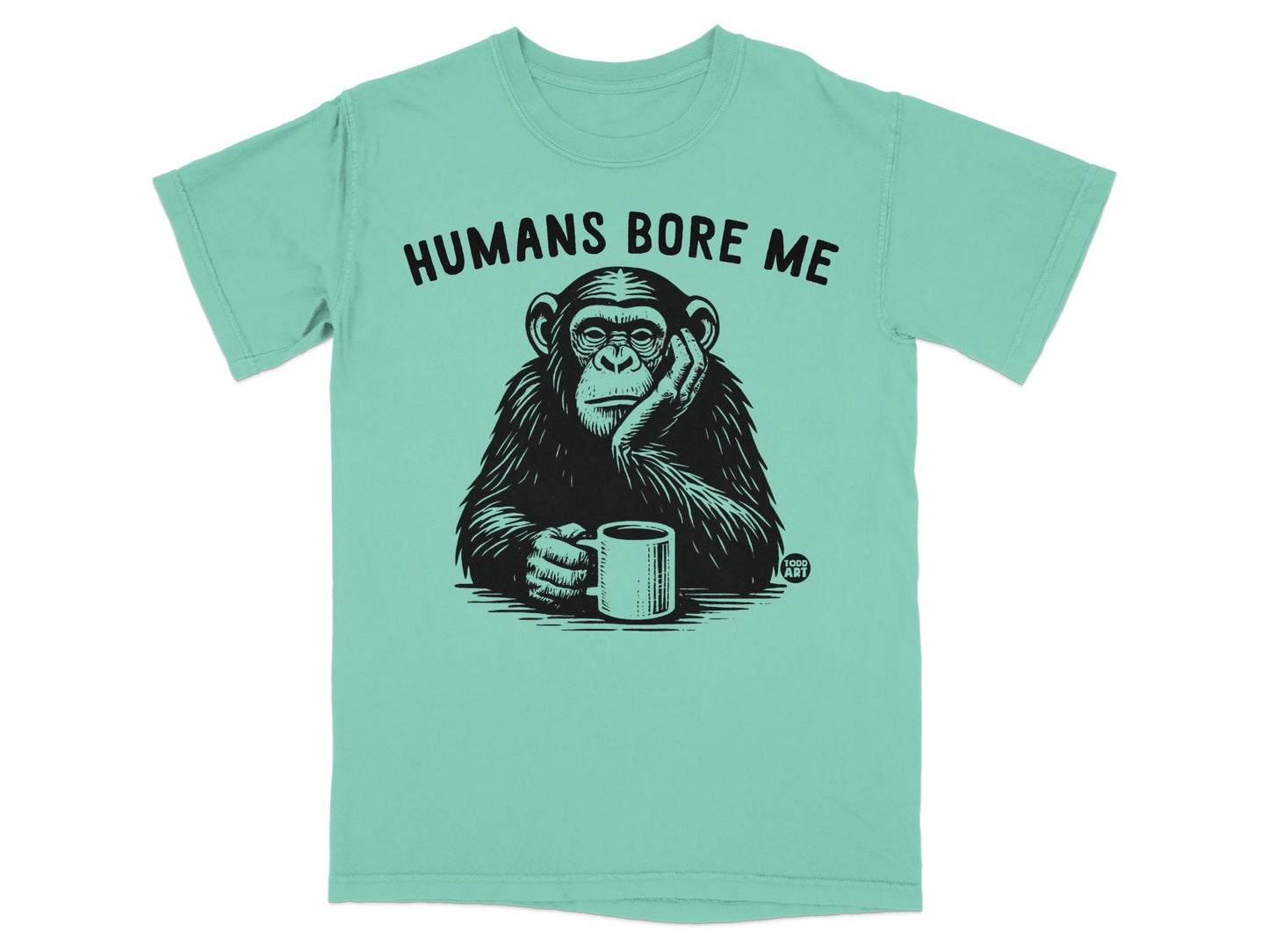 Chimpanzee with coffee mug and "Humans Bore Me" text.