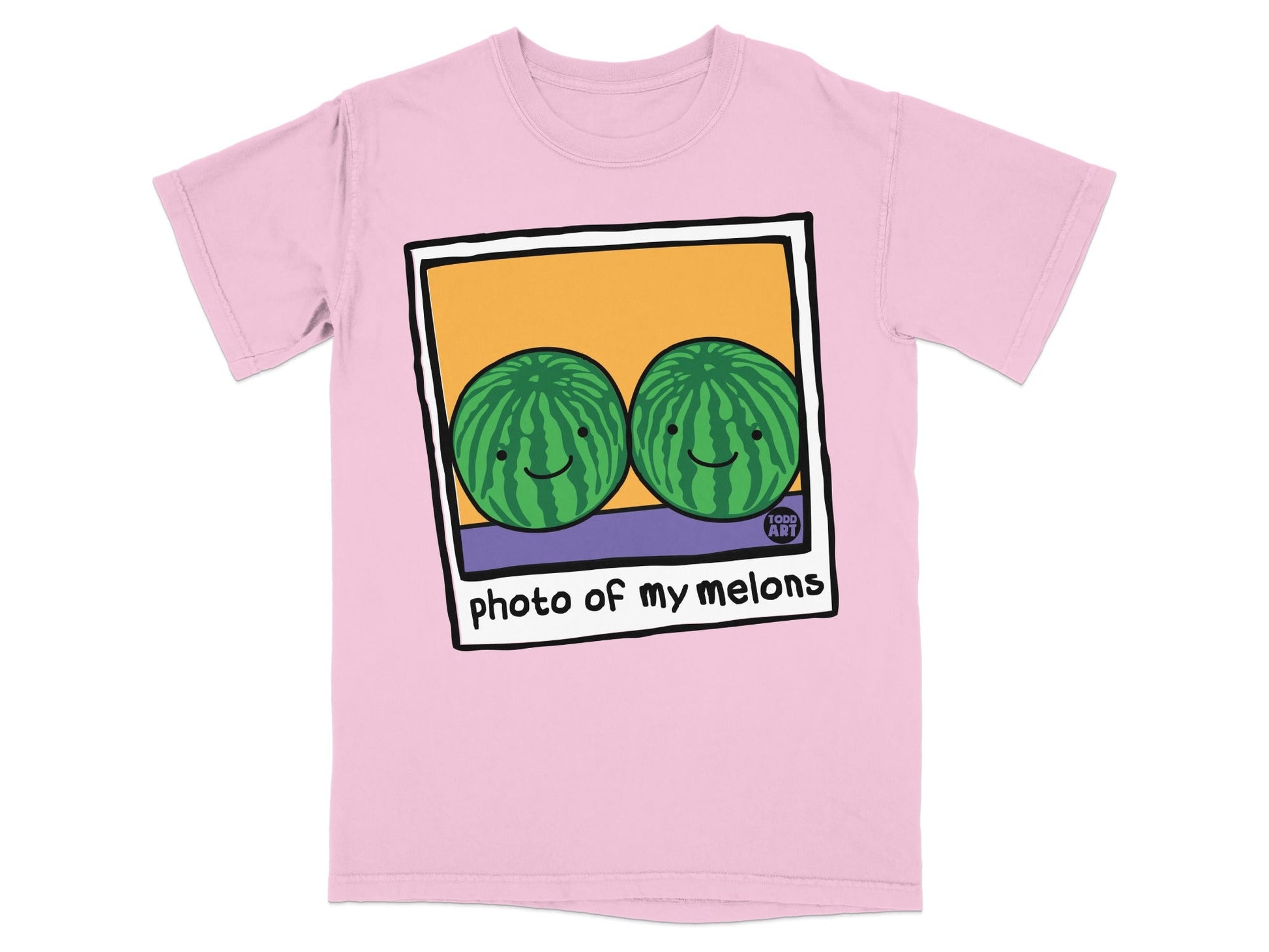 Two cartoon watermelons smiling inside a polaroid frame on a pink t-shirt.