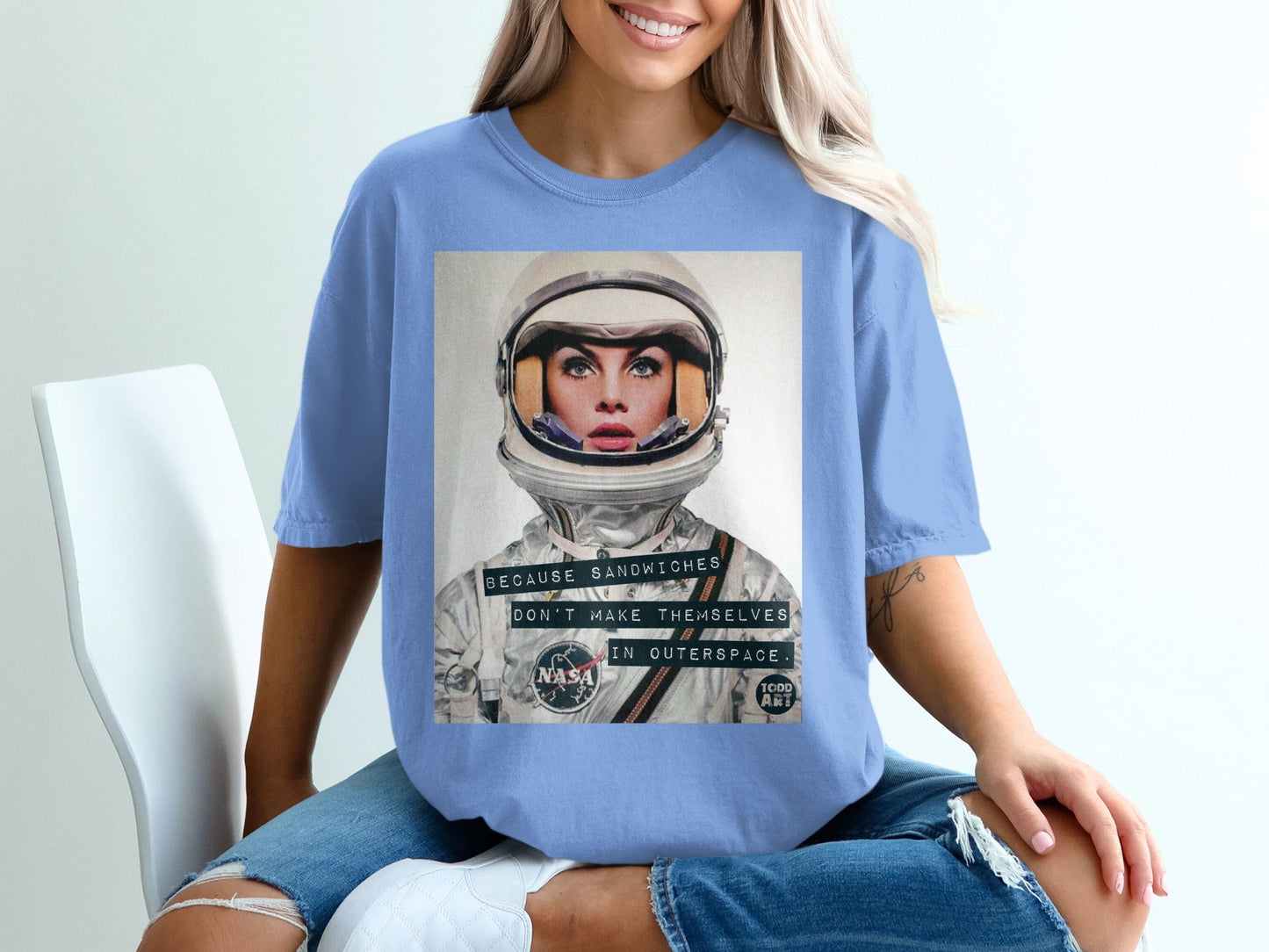 Astronaut's face with NASA logo and text "Because sandwiches don't make themselves in outer space."