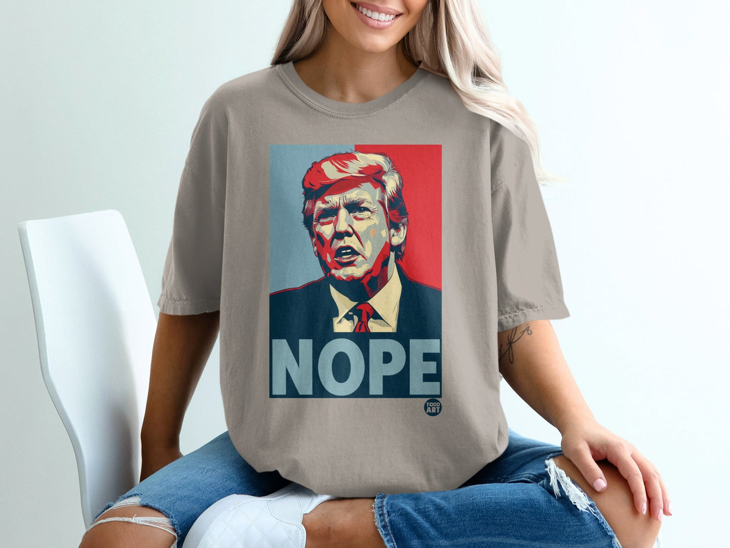 T-shirt featuring a portrait of Donald Trump with the word "NOPE".