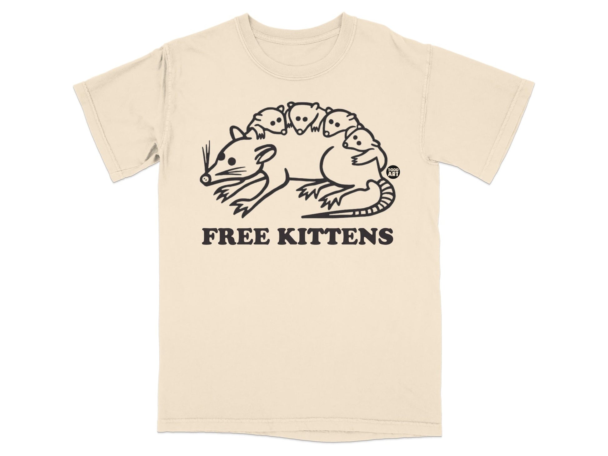 Beige t-shirt with a cartoon opossum carrying kittens, text "FREE KITTENS".