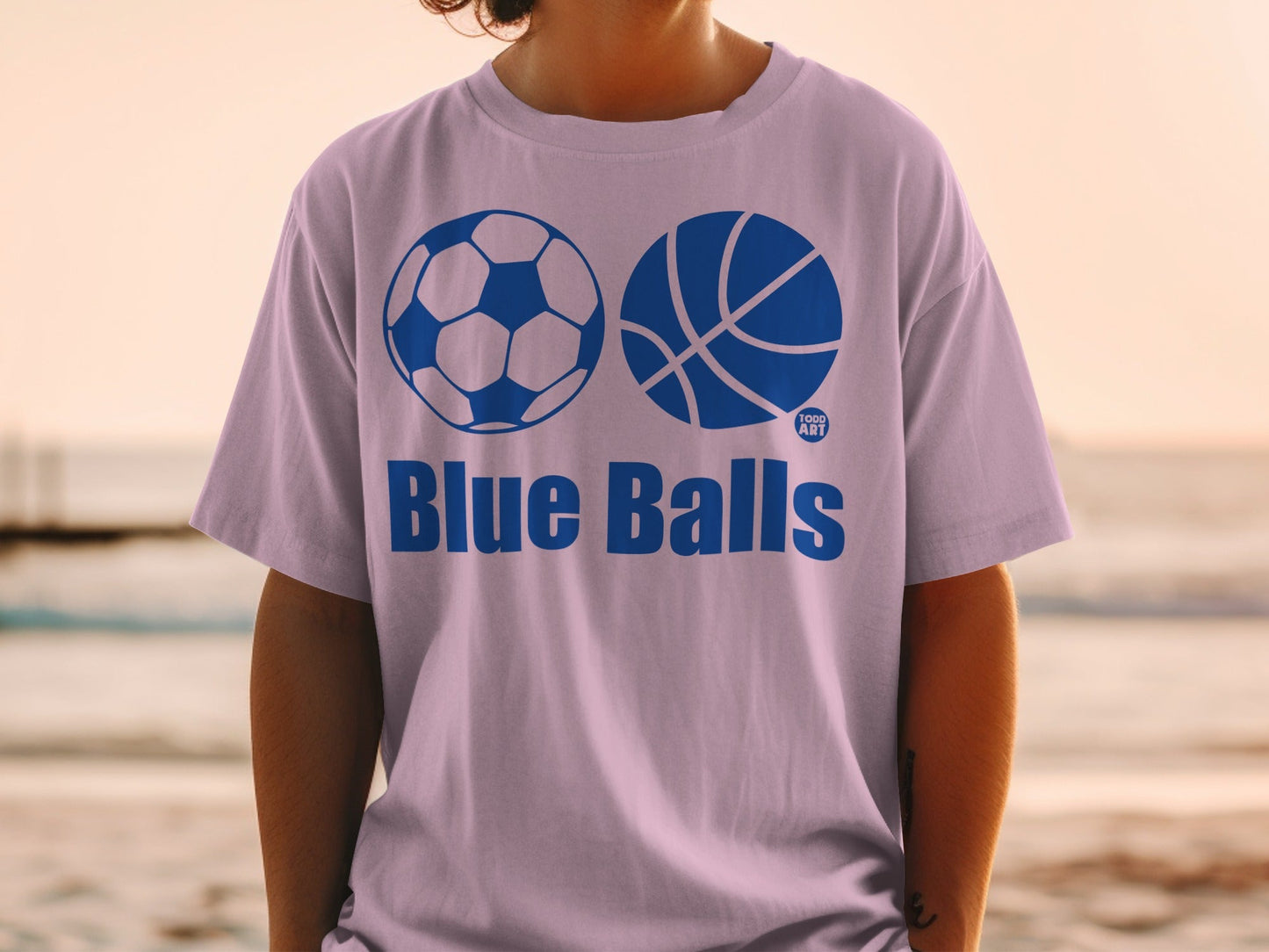 T-shirt with "Blue Balls" text and soccer and basketball graphics.