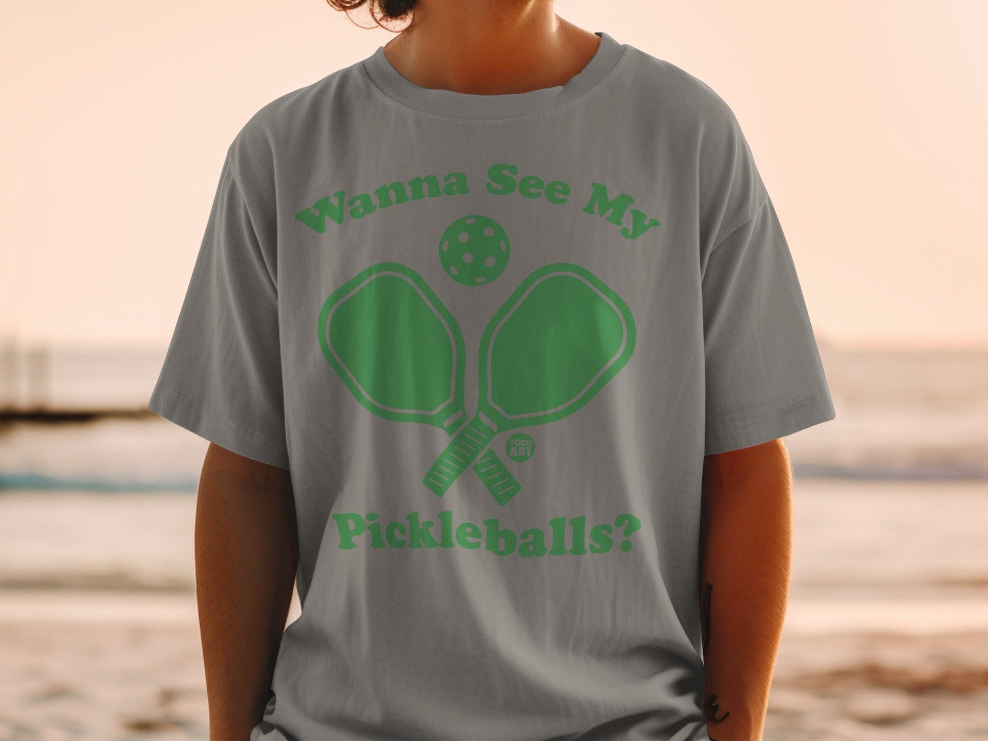 Grey t-shirt with green text and pickleball graphic: "Wanna See My Pickleballs?"