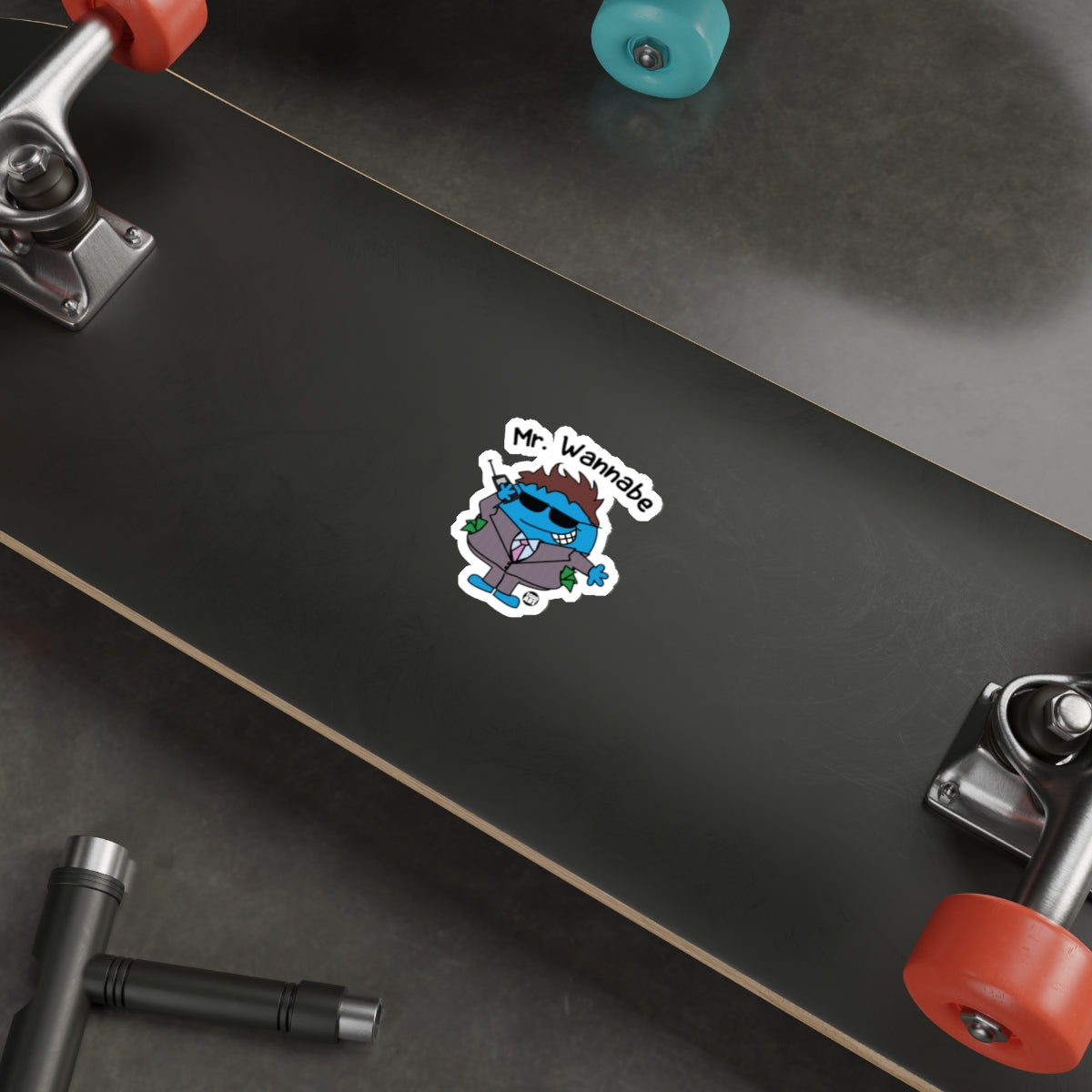 Mr. Wannabe Sticker on Skateboard Deck