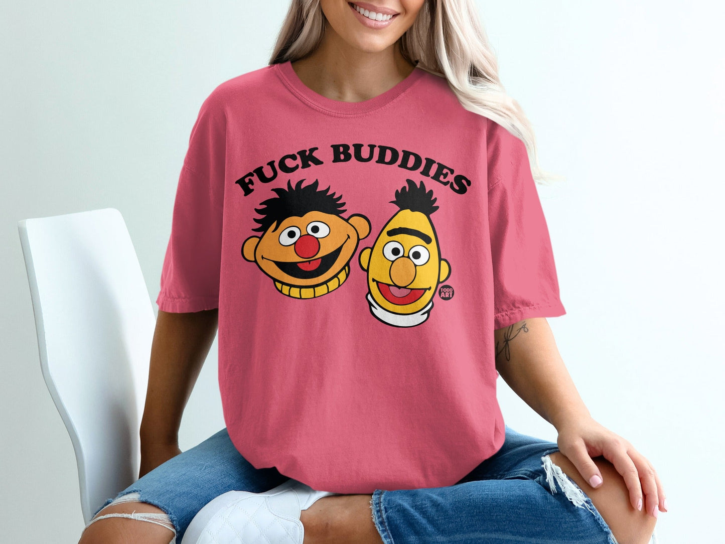 Pink t-shirt with Bert and Ernie graphic and "FUCK BUDDIES" text.