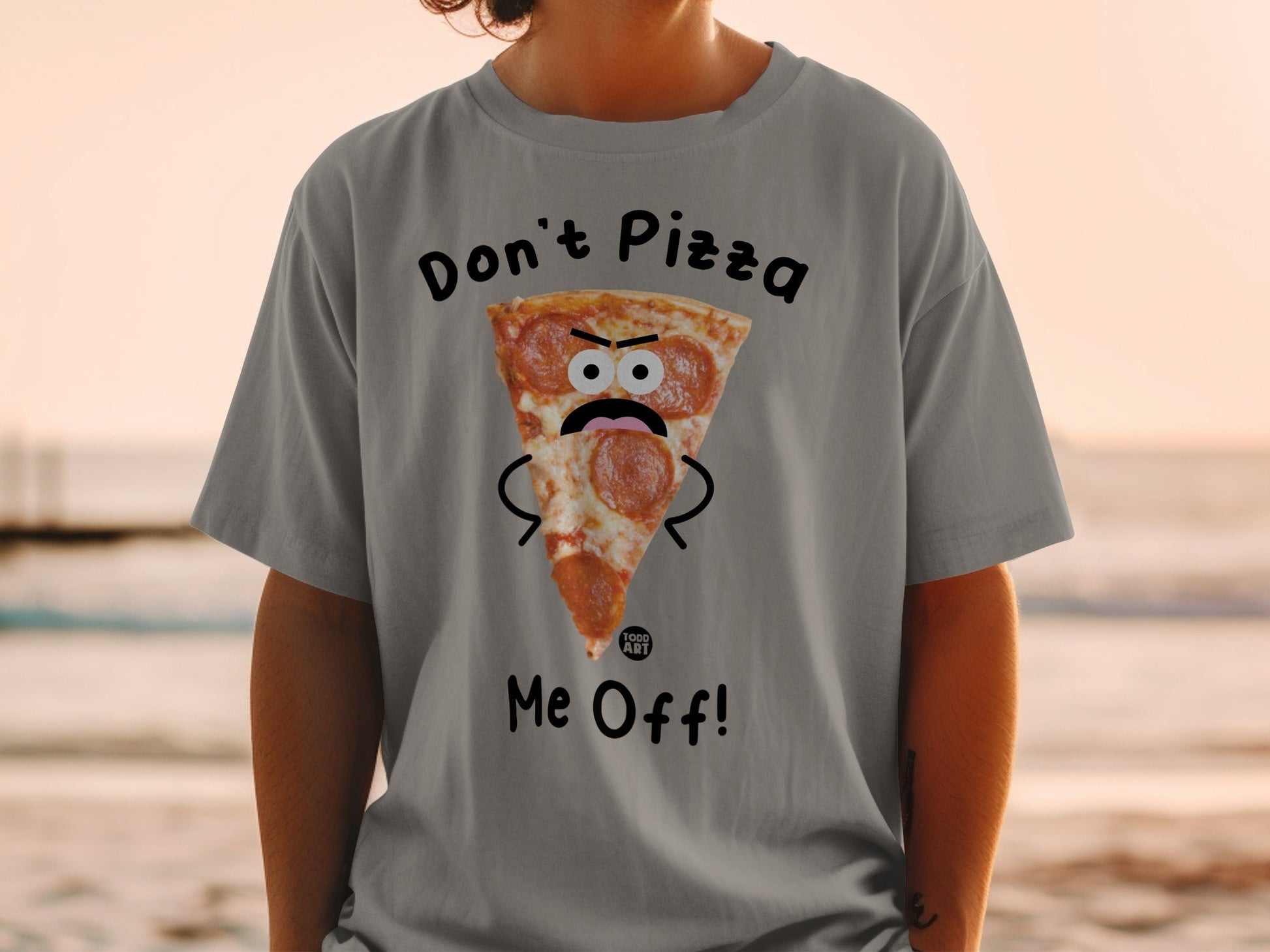 T-shirt with cartoon pizza slice saying "Don't Pizza Me Off!"