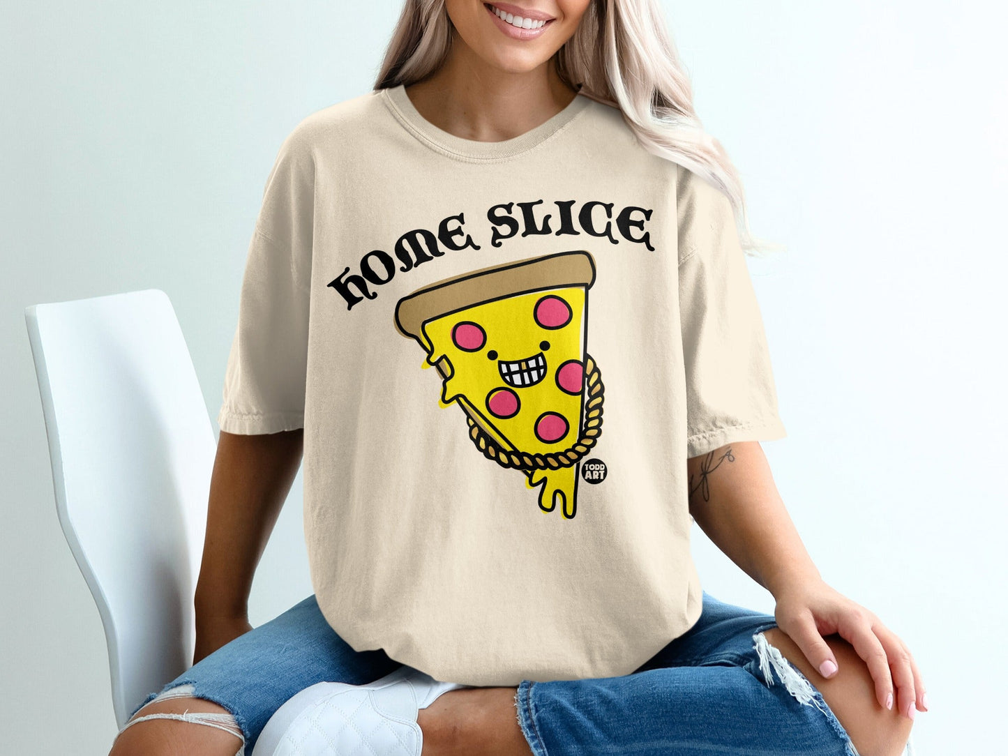 Beige t-shirt with "HOME SLICE" text and cartoon pizza slice wearing a gold chain.